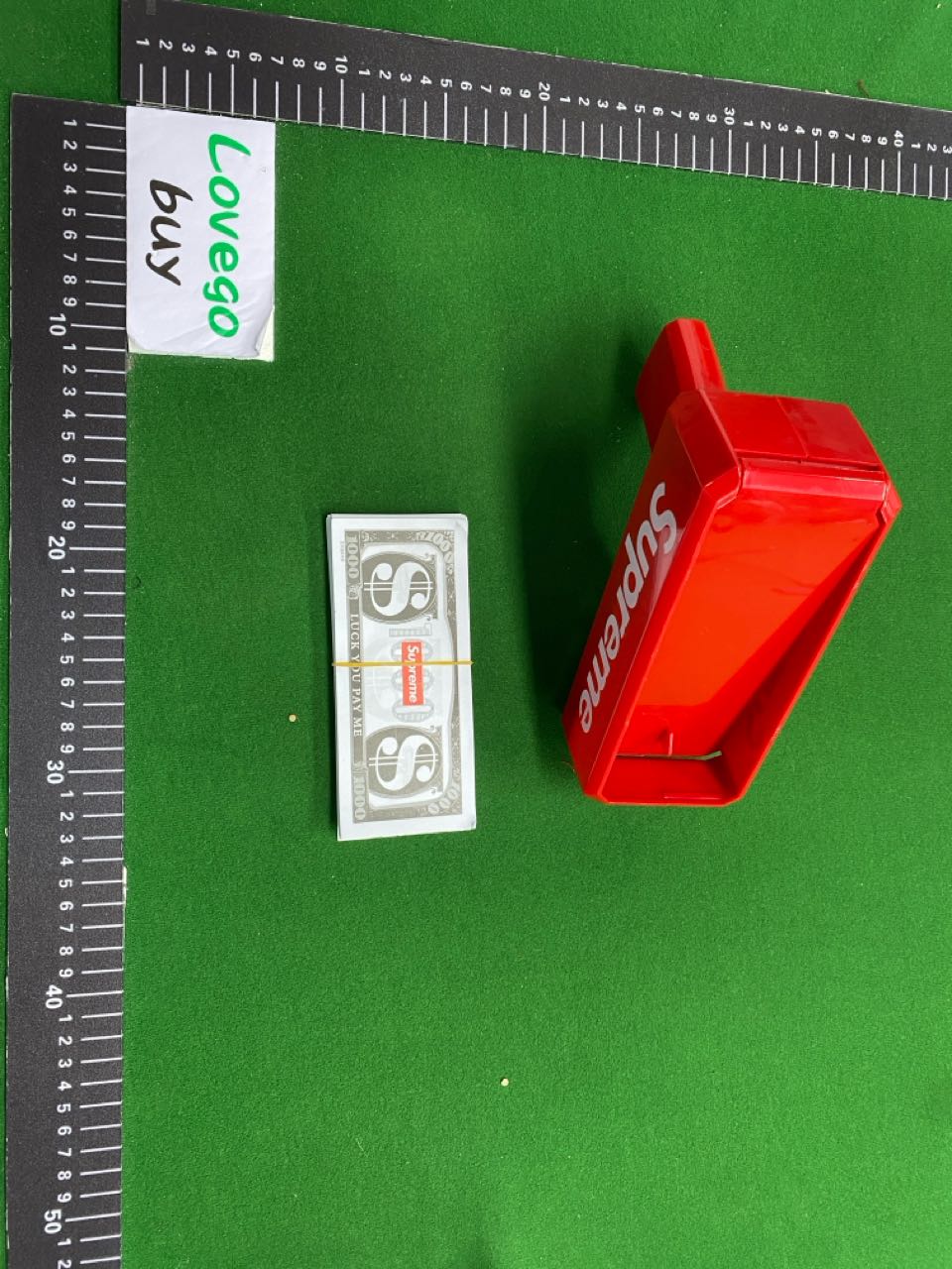 Foto QC 5 de Supreme Cash Cannon Red Plastic Money Gun