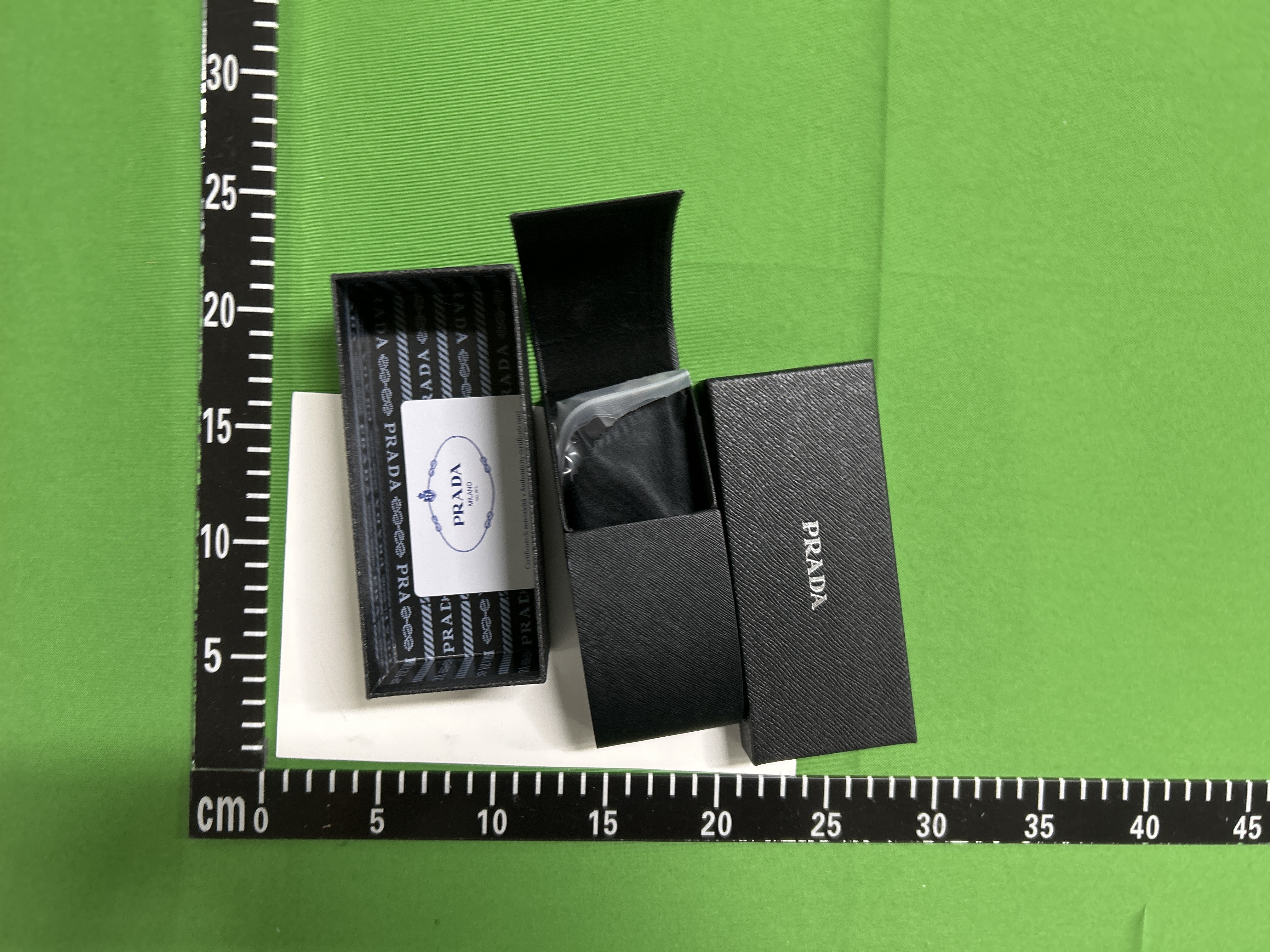 Foto QC 6 de Prada Cat-Eye Acetate Eyeglasses Havana Clear (GP23102)