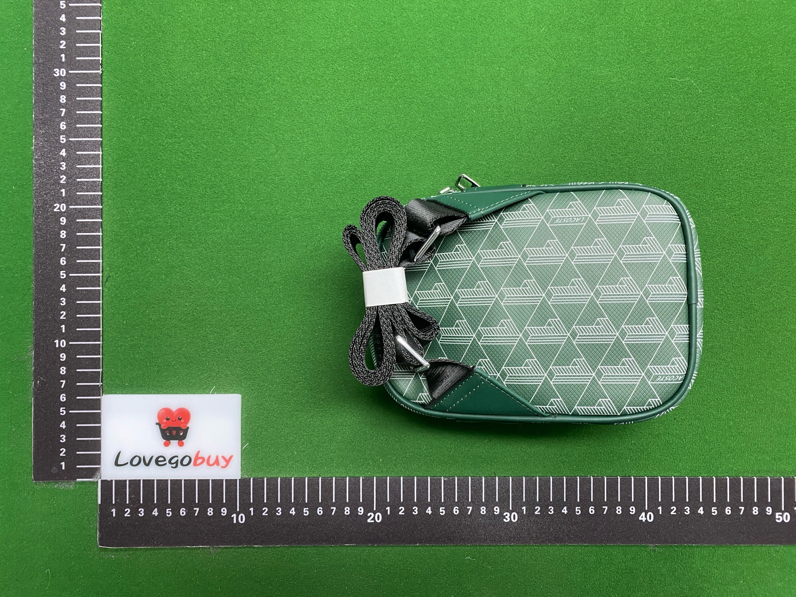 Foto QC 6 de Lacoste The Blend Monogram Vertical Crossbody Bag Green Canvas