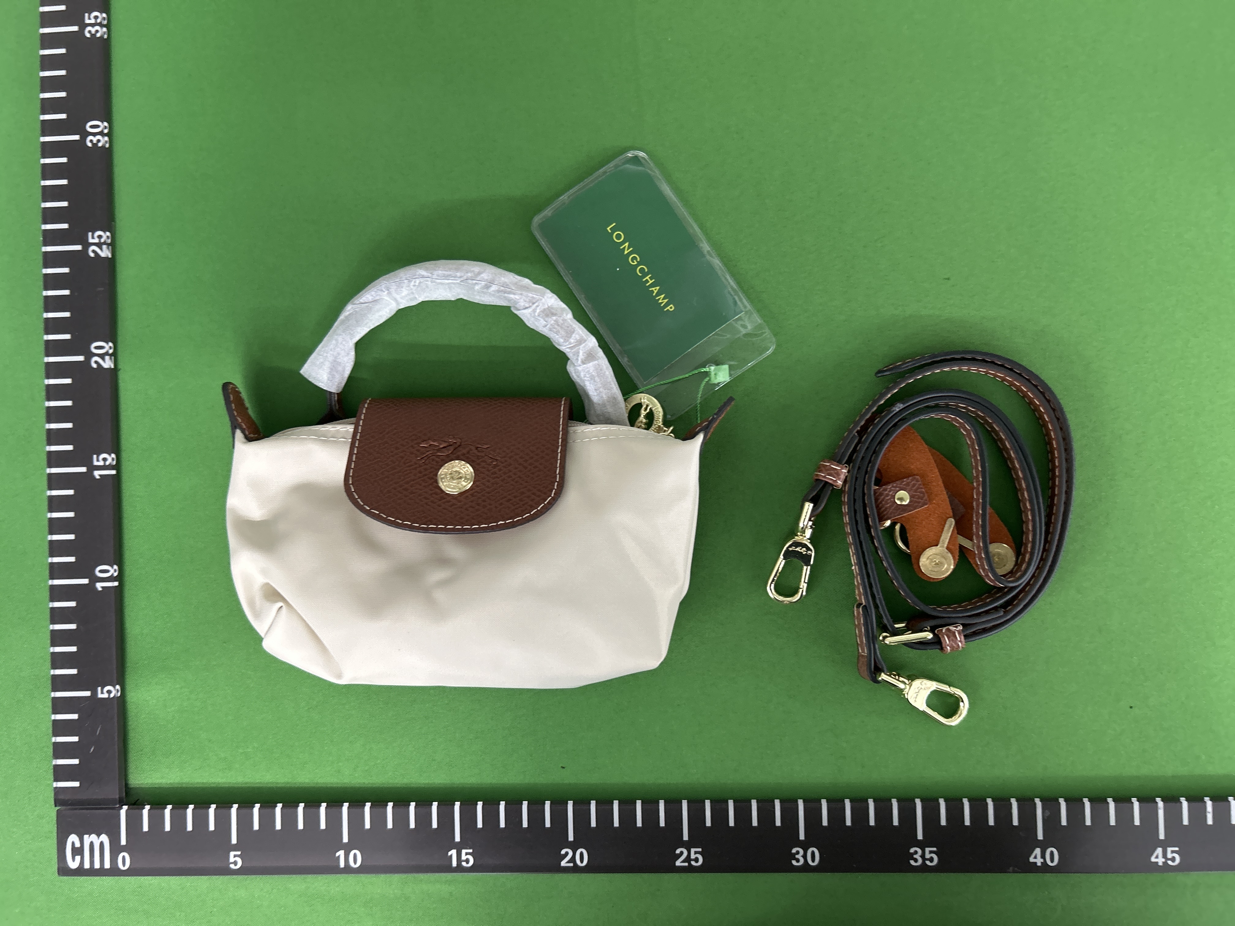 Foto QC 6 de Longchamp Le Pliage Original Pouch with Handle Mini Wheat Yellow