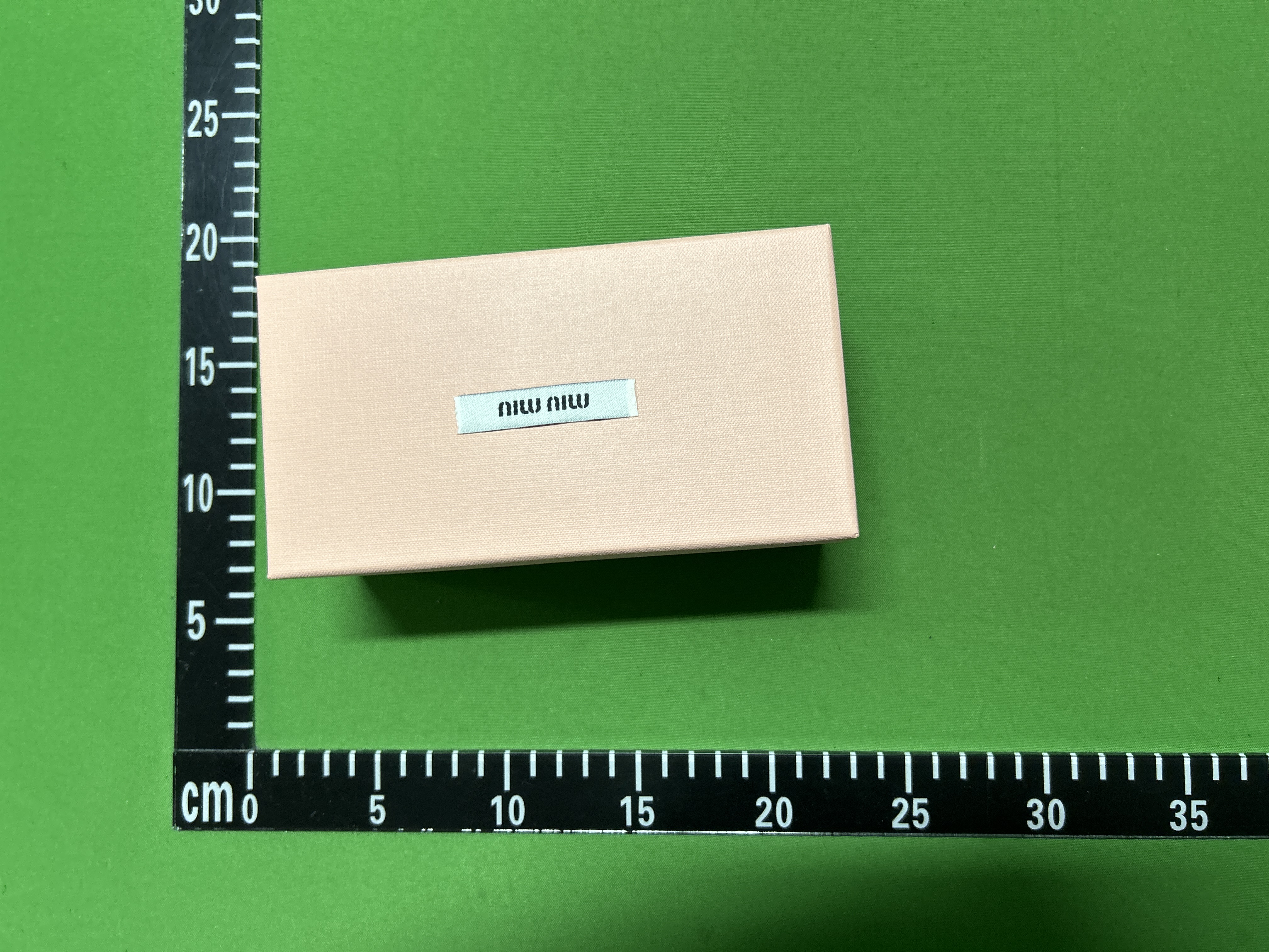 Foto QC 1 de Miu Miu Cat-Eye Acetate Eyeglasses Havana (MU03UV-7S01O1)