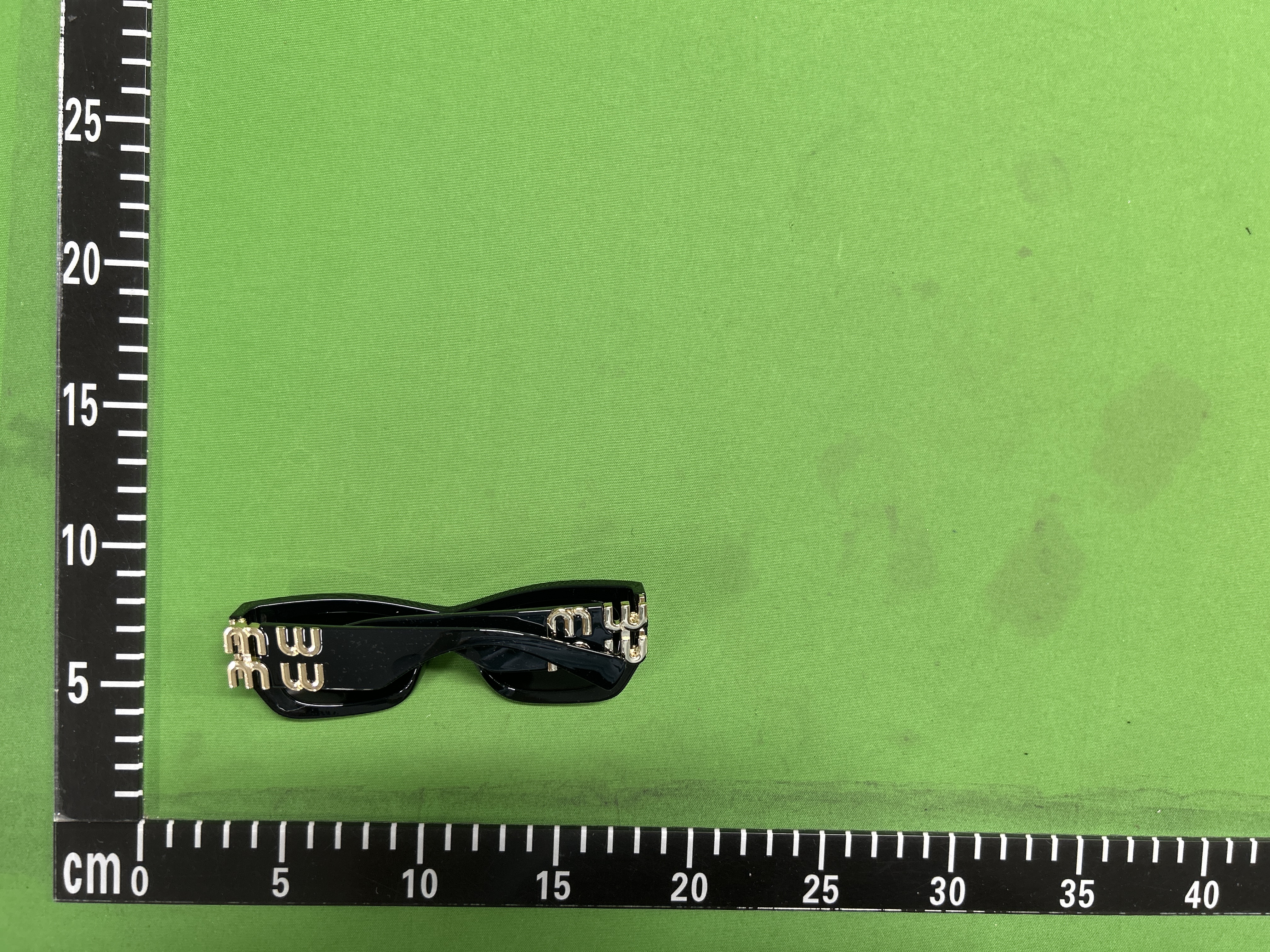 Foto QC 3 de Miu Miu Cat-Eye Acetate Sunglasses Havana Grey (MU 04ZS)