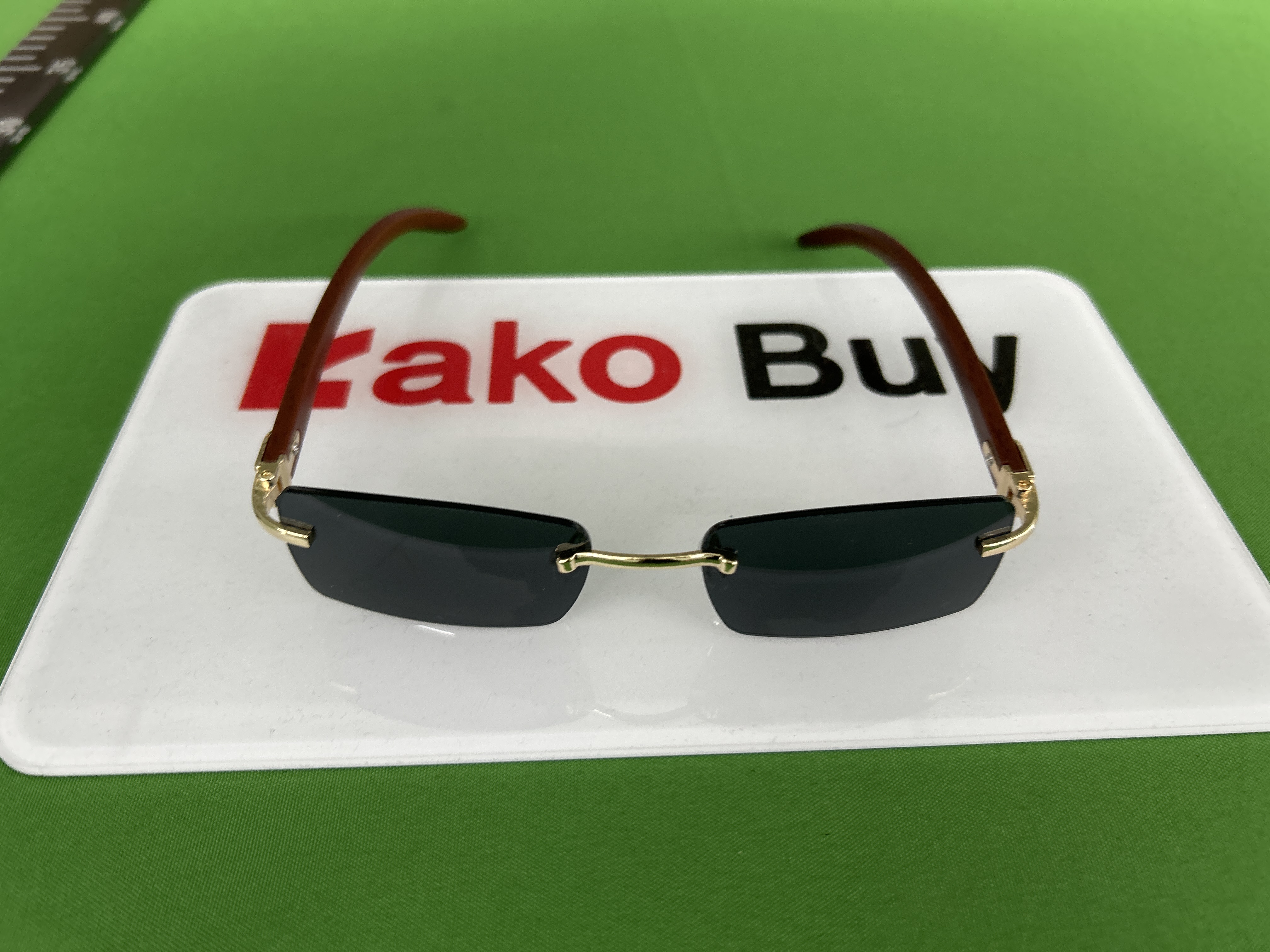 Foto QC 1 de Cartier Rimless Square-Frame Wood Sunglasses Gold Brown Gradient Blue (CT0052S)