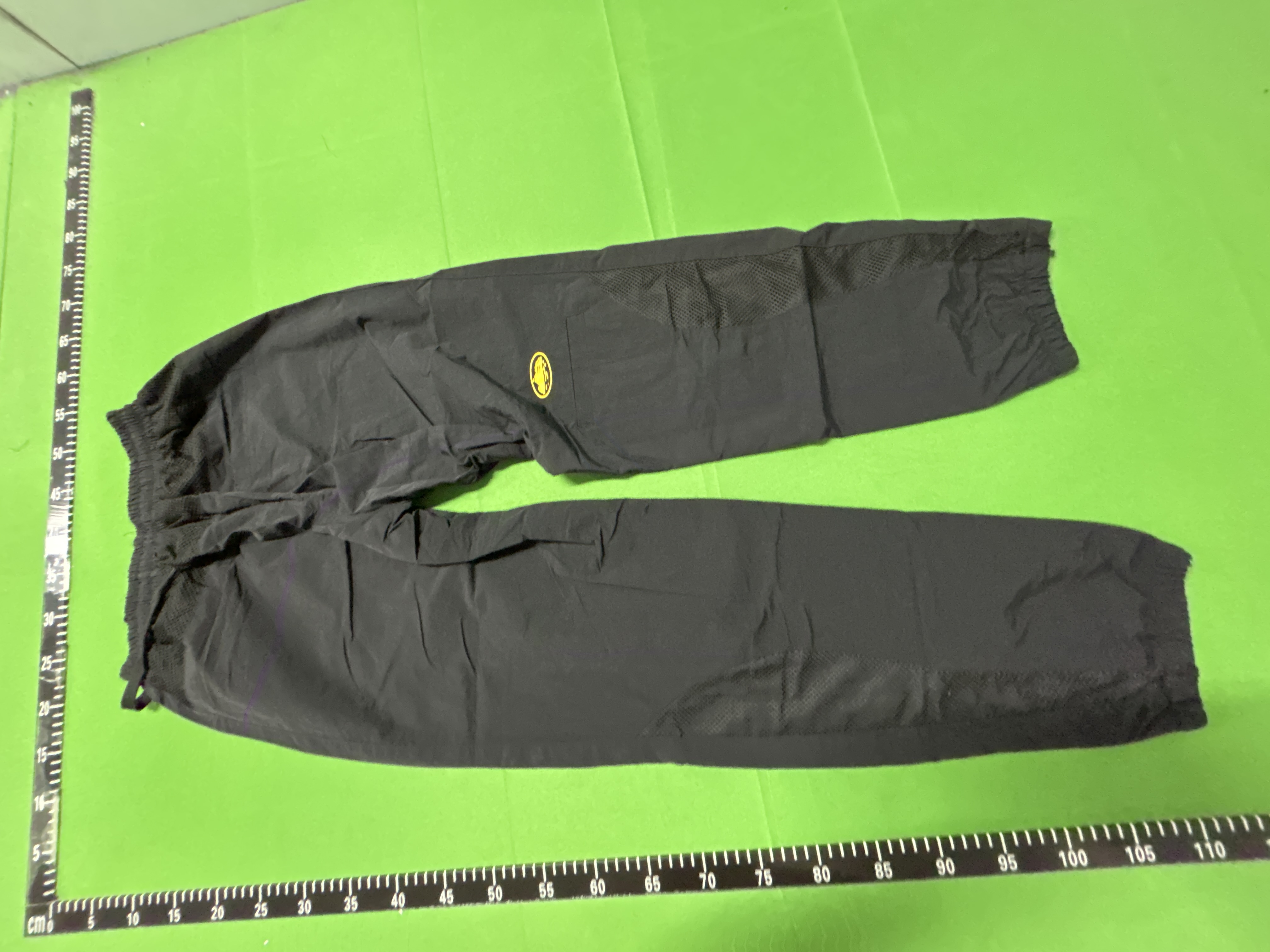 Foto QC 7 de Syna World Logo Shell Track Pants Black Orange