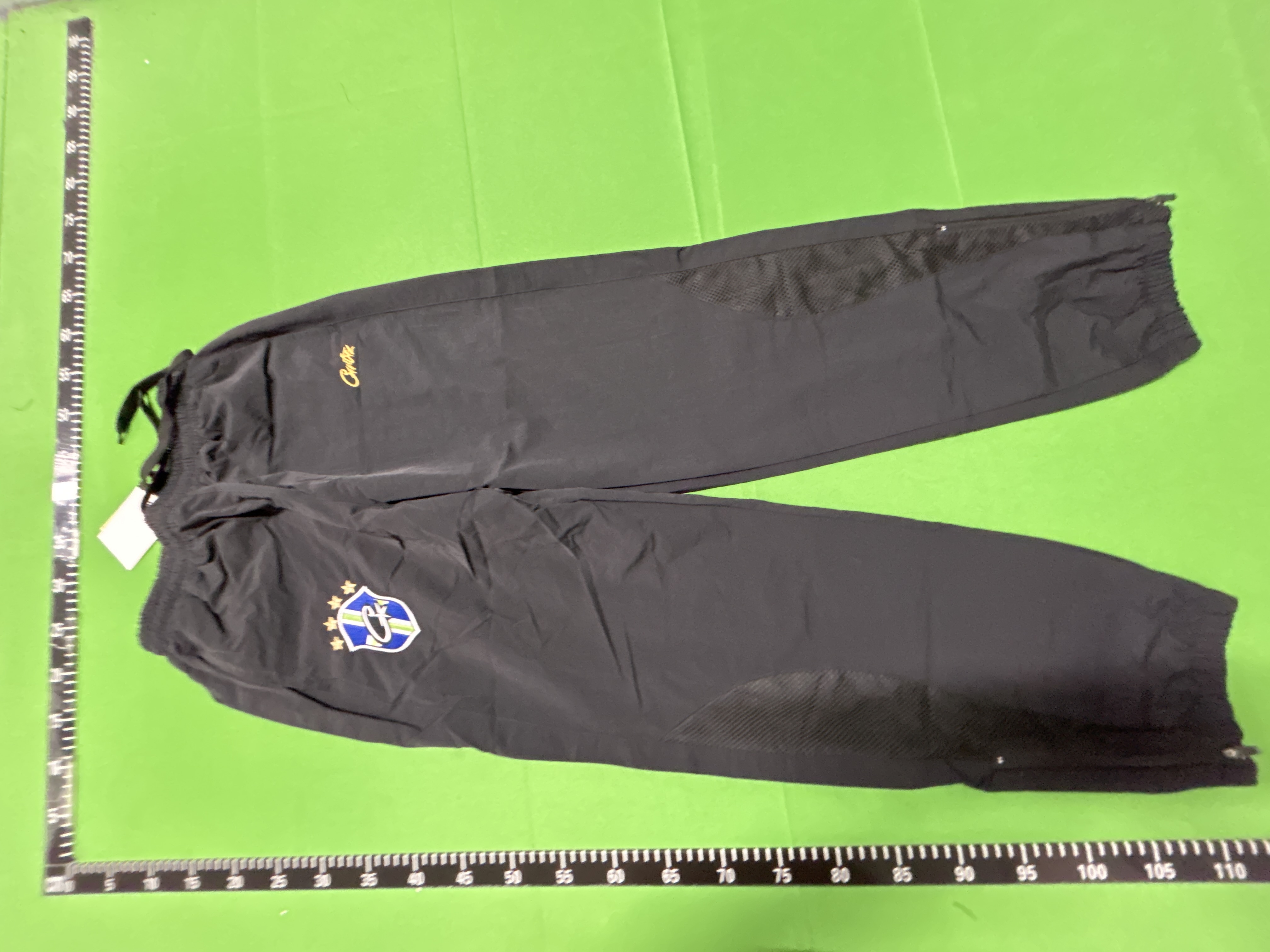 Foto QC 8 de Syna World Logo Shell Track Pants Black Orange