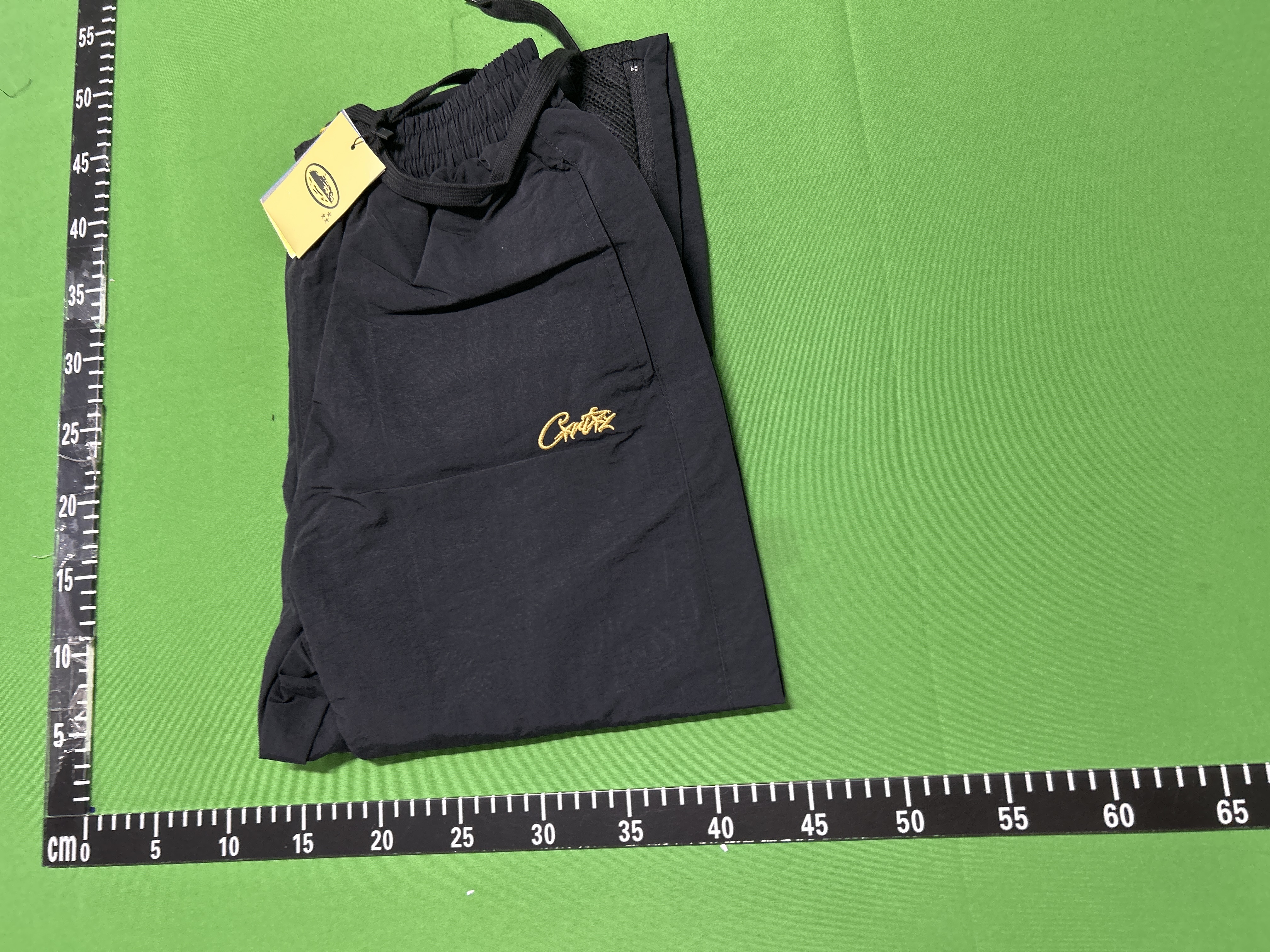 Foto QC 5 de Syna World Logo Shell Track Pants Black Orange