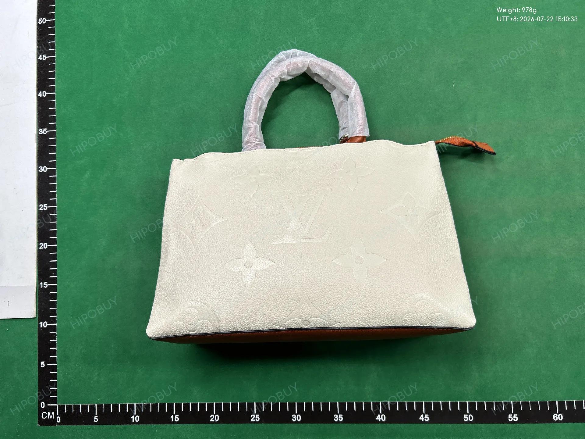 Foto QC 1 de Louis Vuitton Monogram Empreinte Top Handle Set White