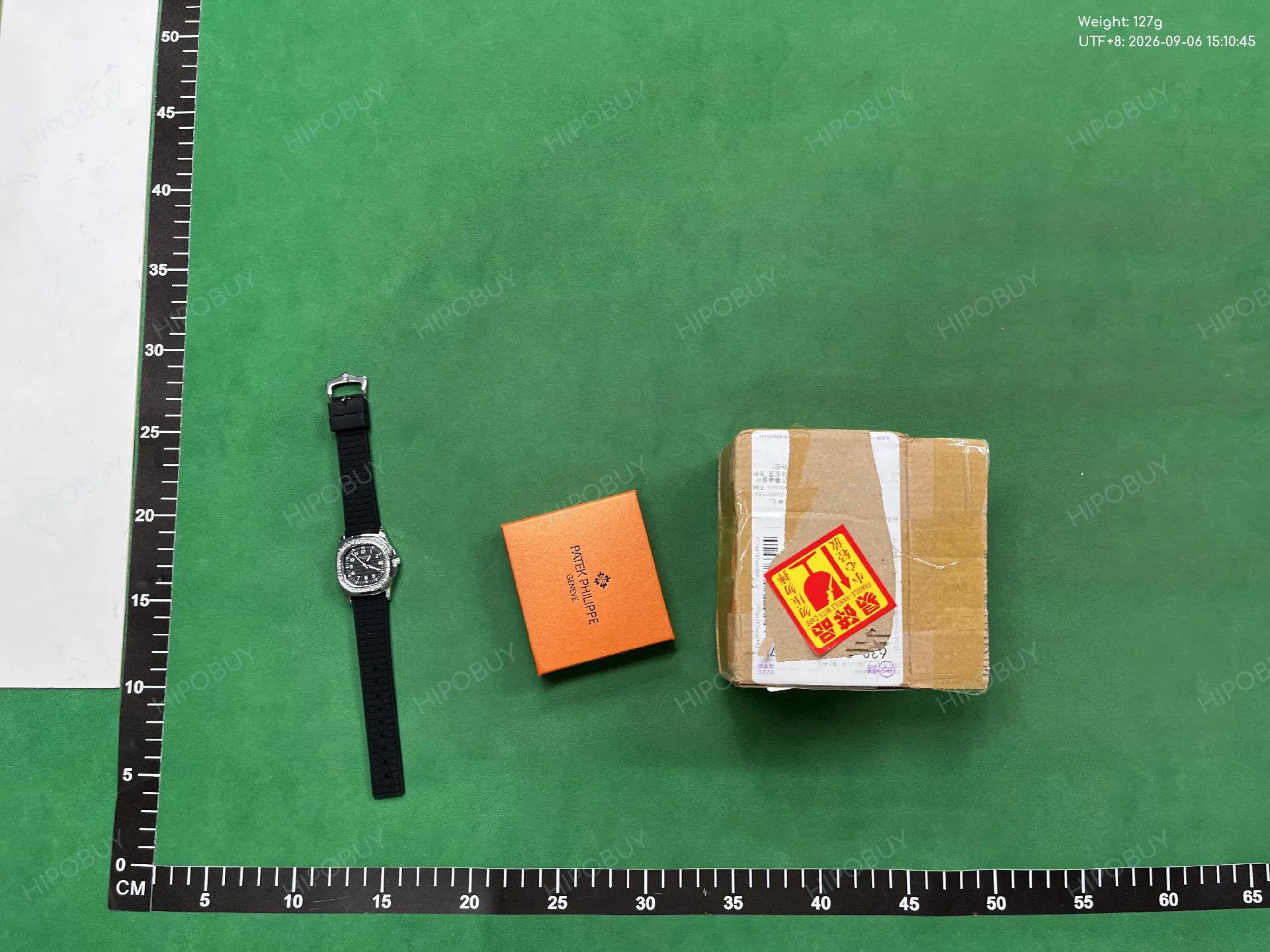 Foto QC 3 de Patek Philippe Nautilus Diamond Quartz 7010