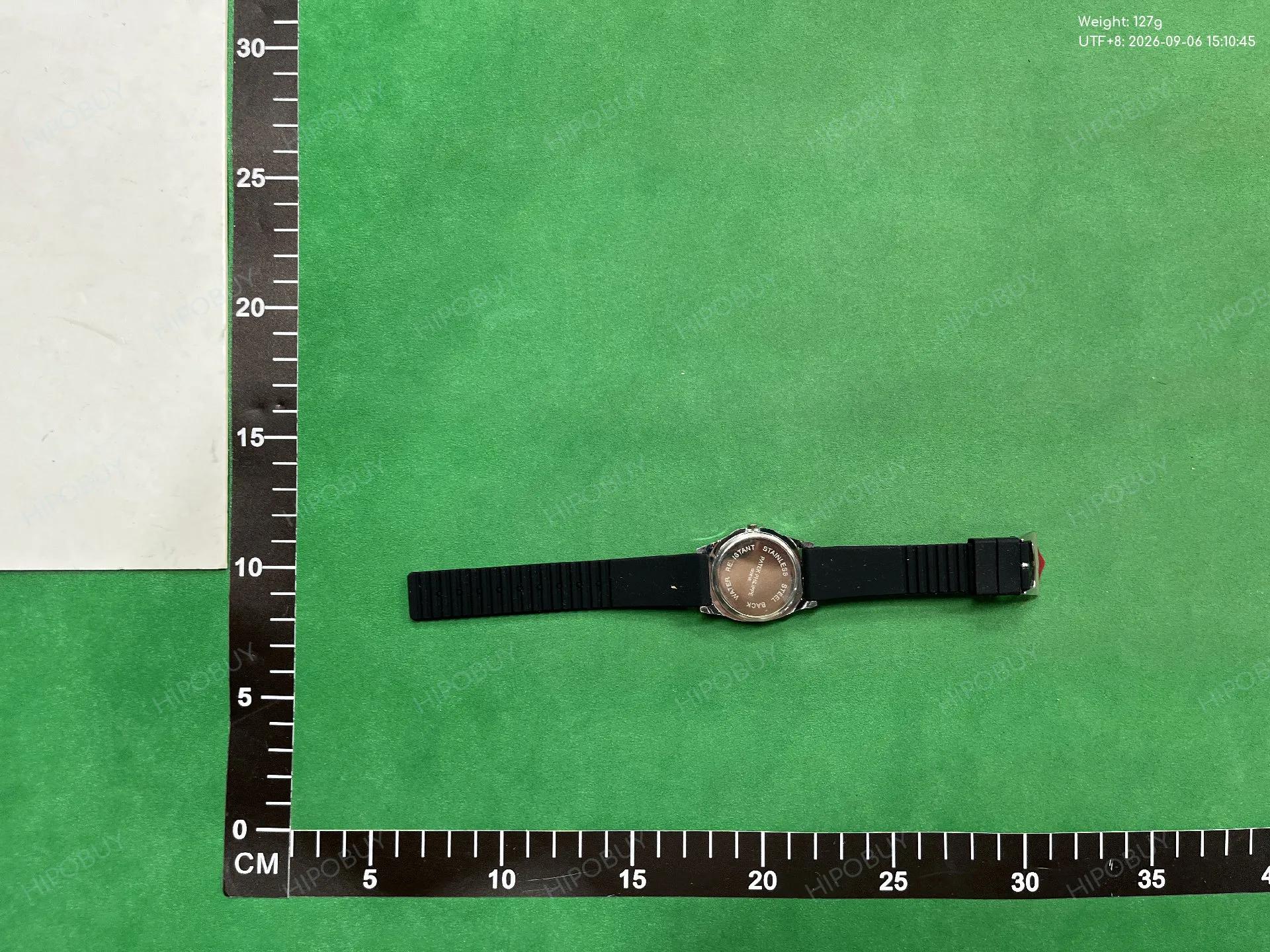 Foto QC 2 de Patek Philippe Nautilus Diamond Quartz 7010