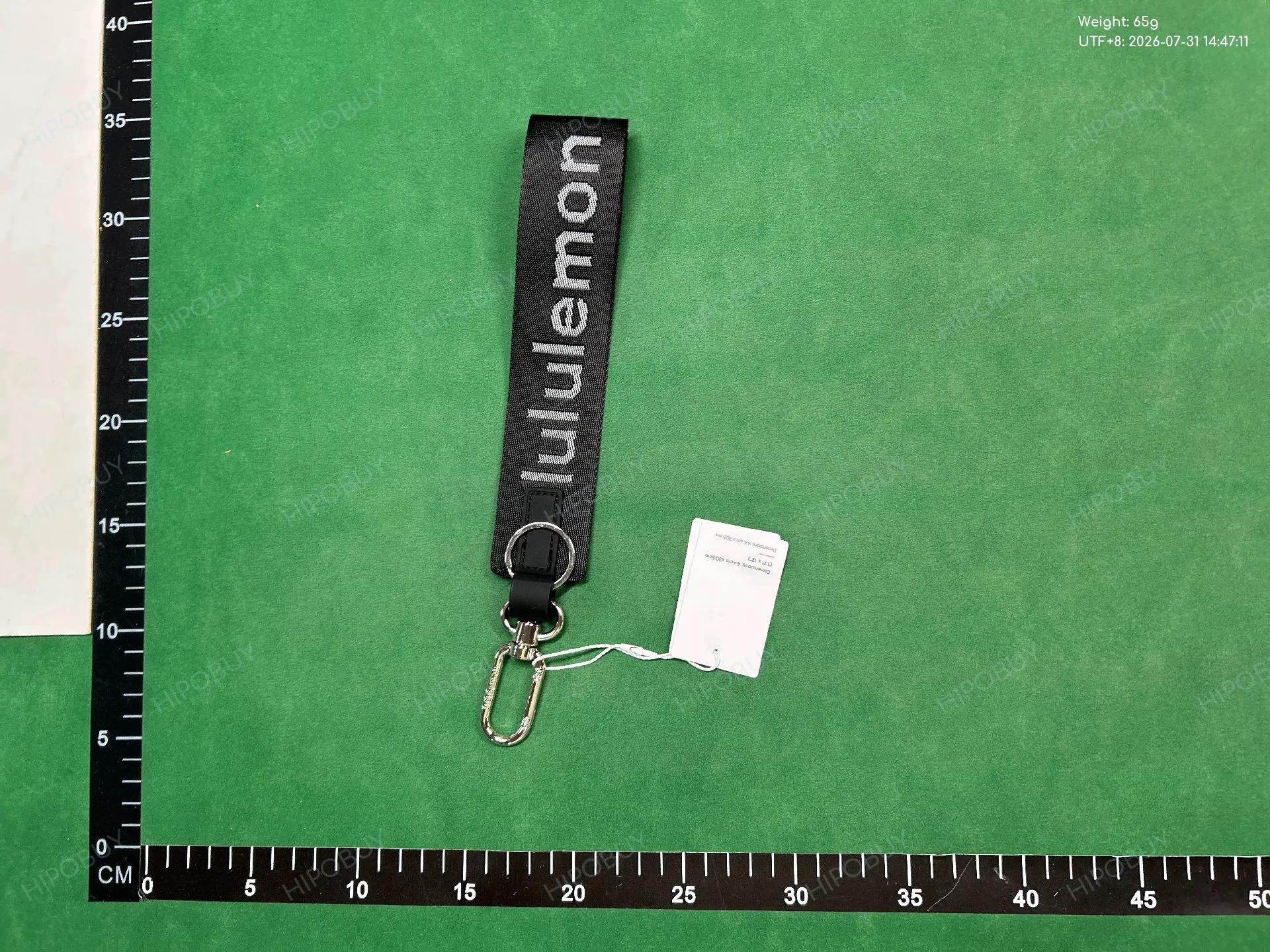 Foto QC 7 de Lululemon Never Lost Keychain Blue