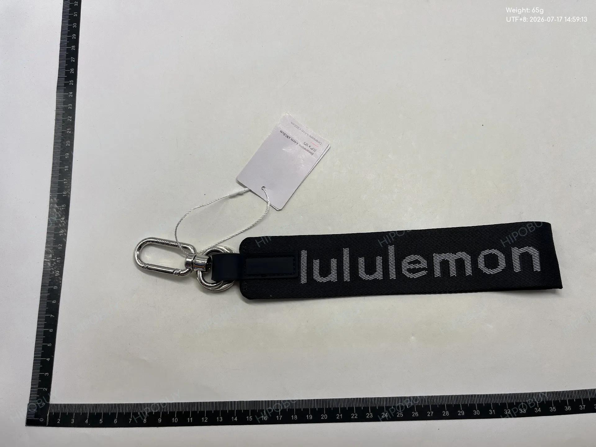 Foto QC 8 de Lululemon Never Lost Keychain Blue