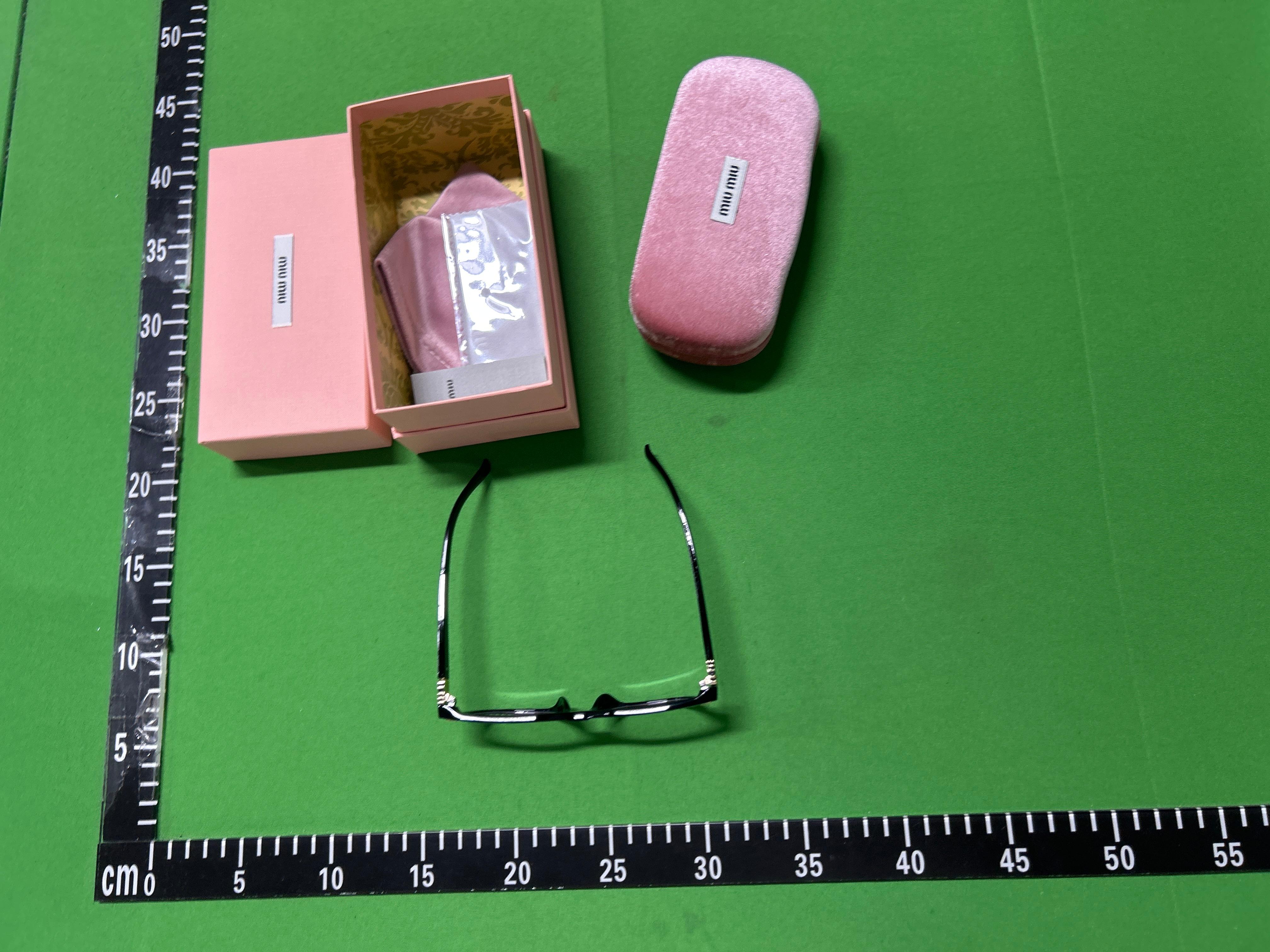 Foto QC 6 de Miu Miu Oval-Frame Acetate Sunglasses Havana Brown (SMU04P)