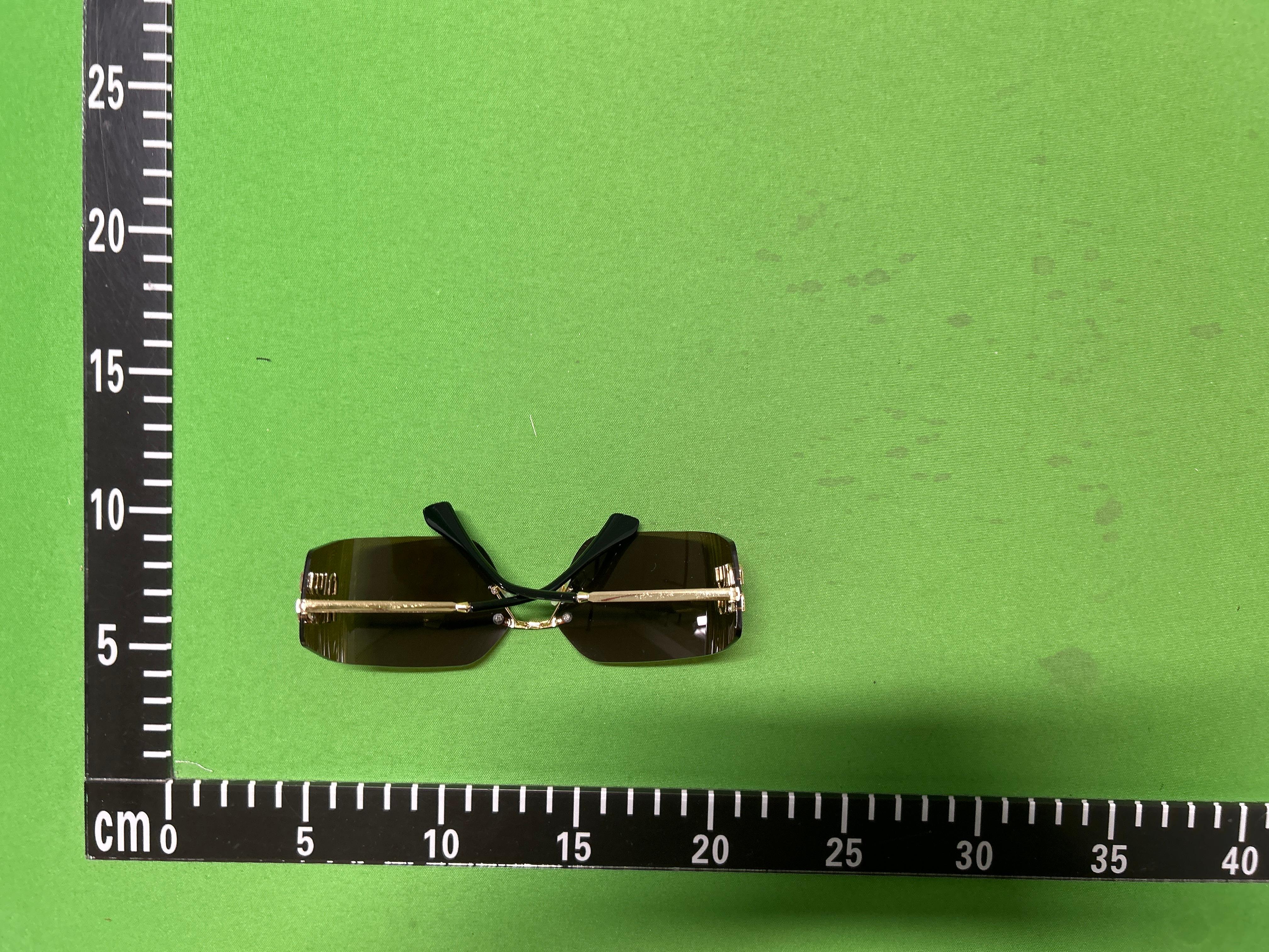 Foto QC 4 de Miu Miu Rimless Metal Sunglasses Gold Brown