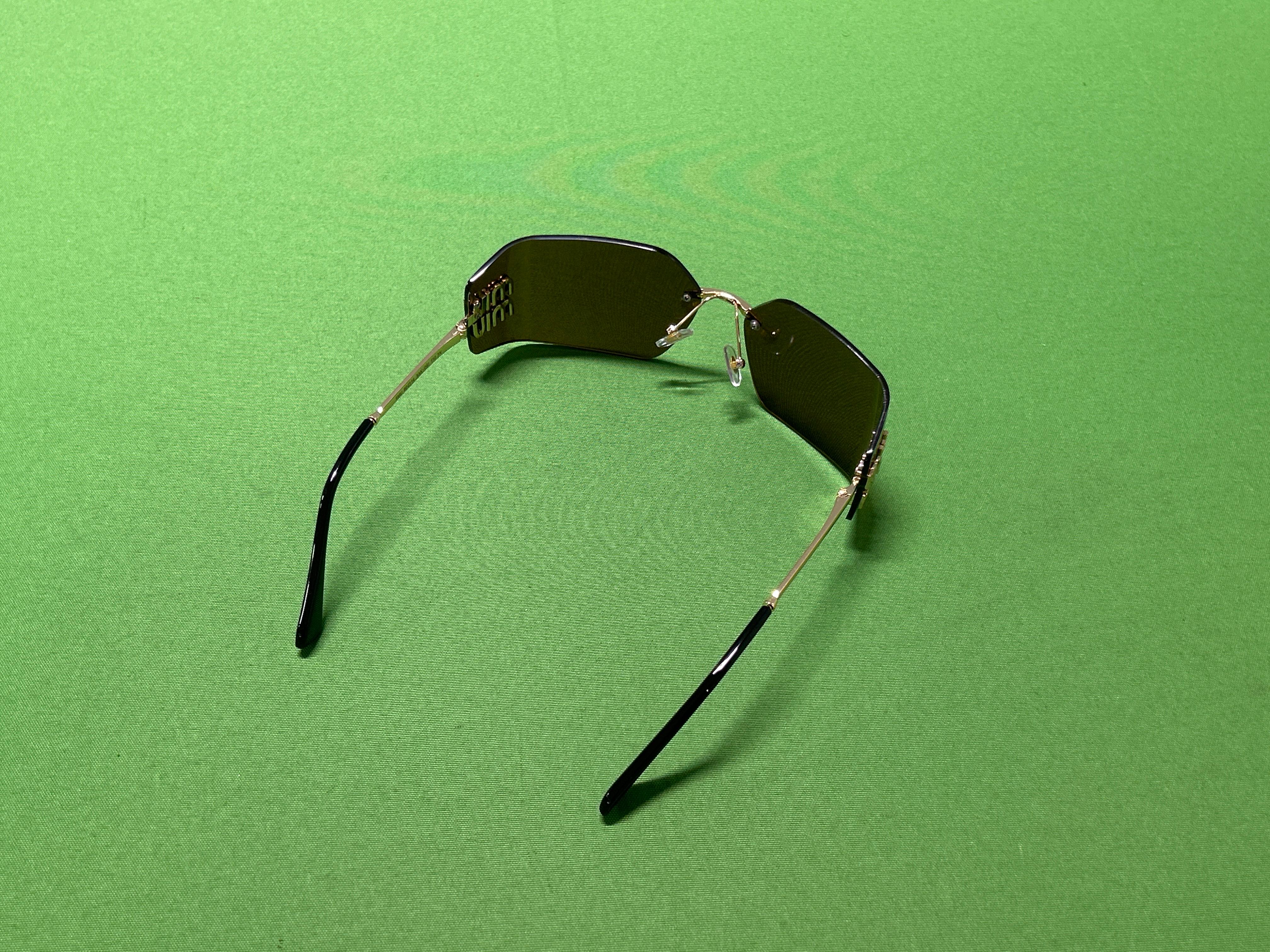 Foto QC 6 de Miu Miu Rimless Metal Sunglasses Gold Brown