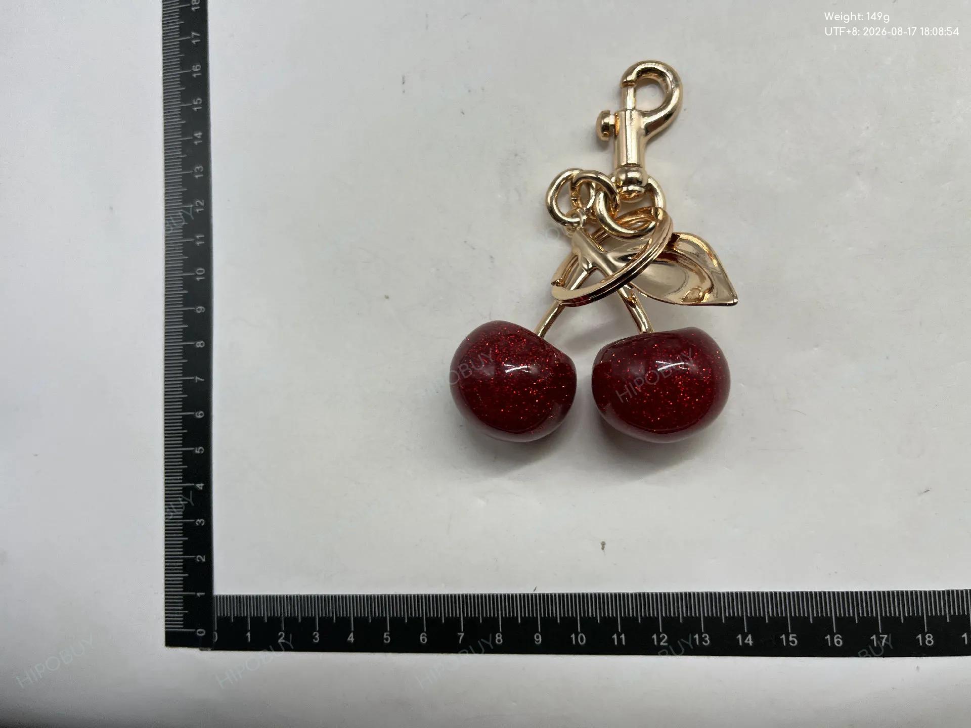 Foto QC 3 de Coach Cherry Key Holder And Bag Charm Pink