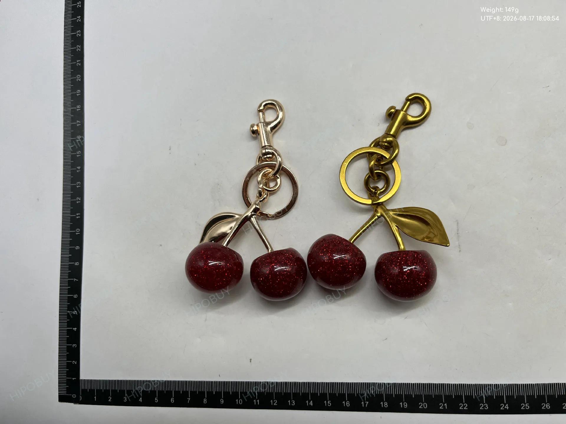 Foto QC 5 de Coach Cherry Key Holder And Bag Charm Pink