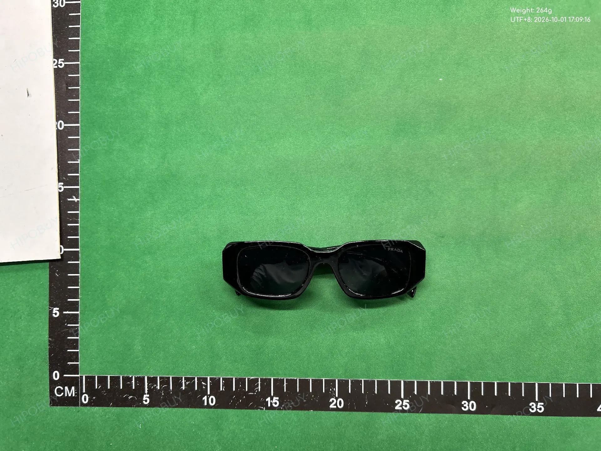 Foto QC 5 de Prada Symbole Acetate Sunglasses Light Blue Grey (PR 17WS)