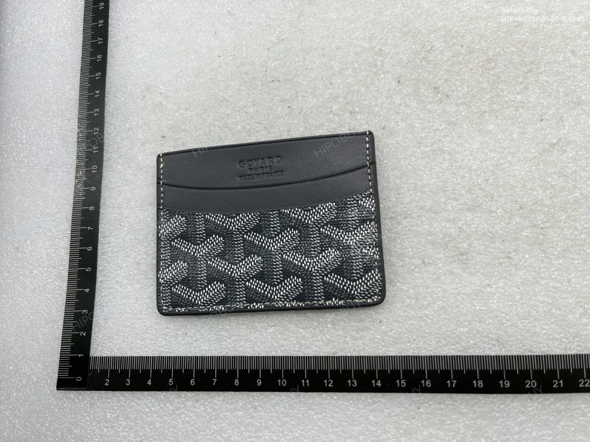 Foto QC 7 de Goyard Conti Pouch Green Goyardine Canvas