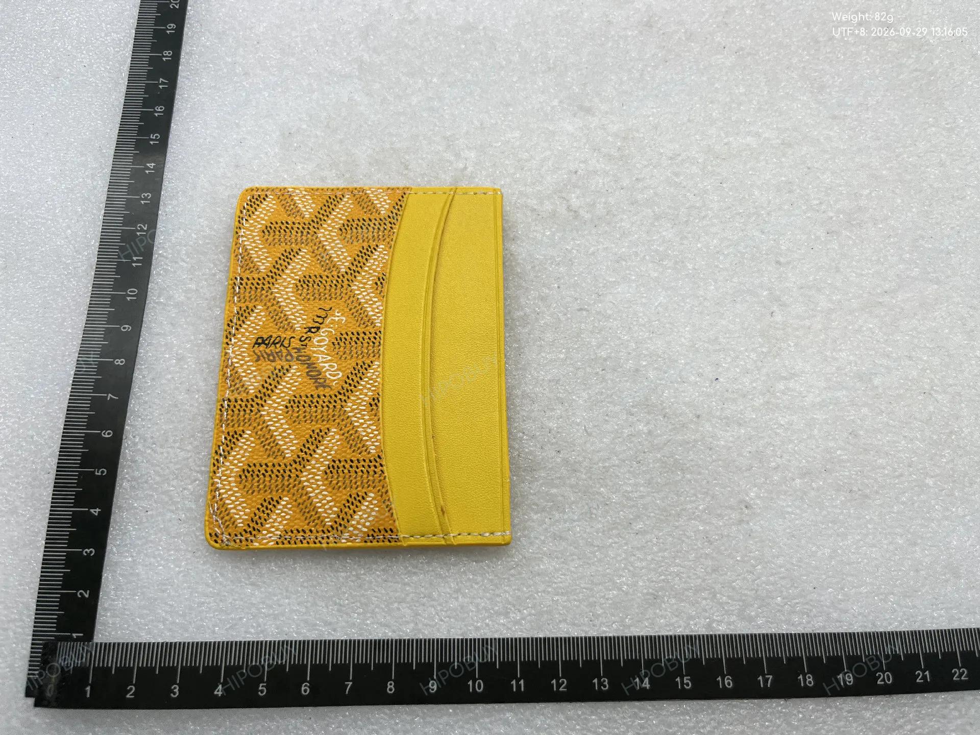 Foto QC 5 de Goyard Conti Pouch Green Goyardine Canvas