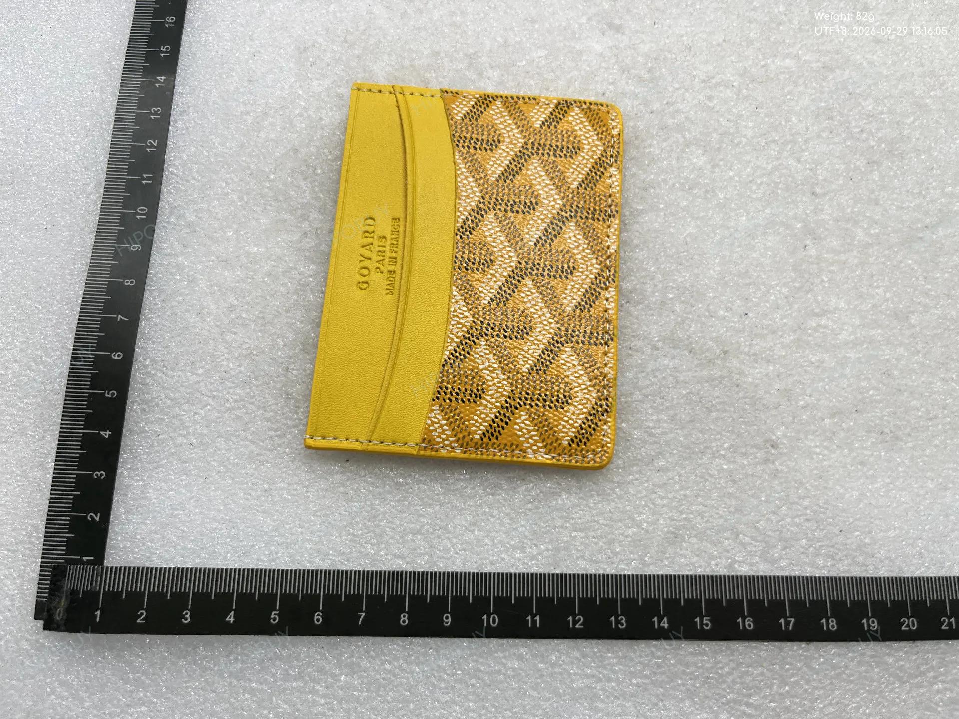 Foto QC 4 de Goyard Conti Pouch Green Goyardine Canvas