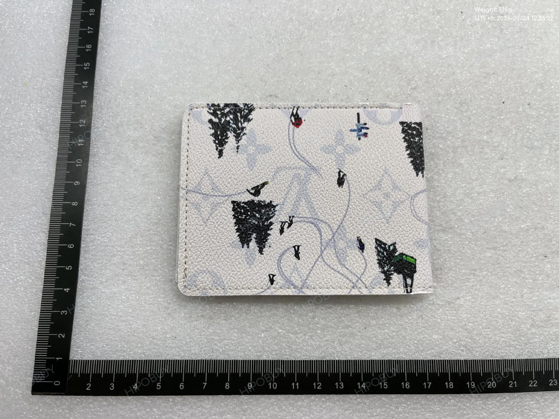 Foto QC 4 de Louis Vuitton Ski Slender Wallet Coated Canvas White