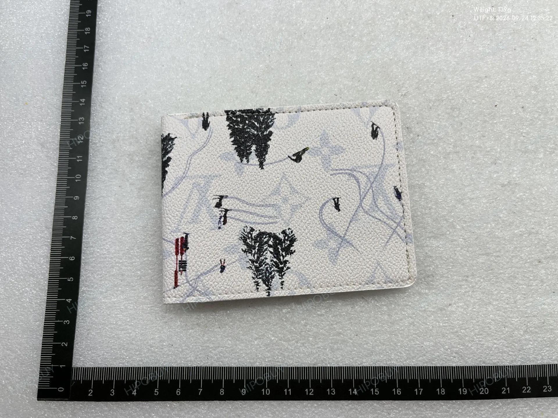 Foto QC 5 de Louis Vuitton Ski Slender Wallet Coated Canvas White