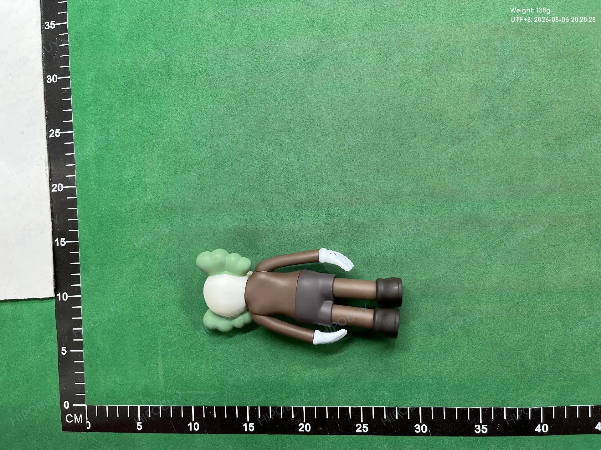 Foto QC 2 de KAWS Holiday Companion Passing Through PVC Figure