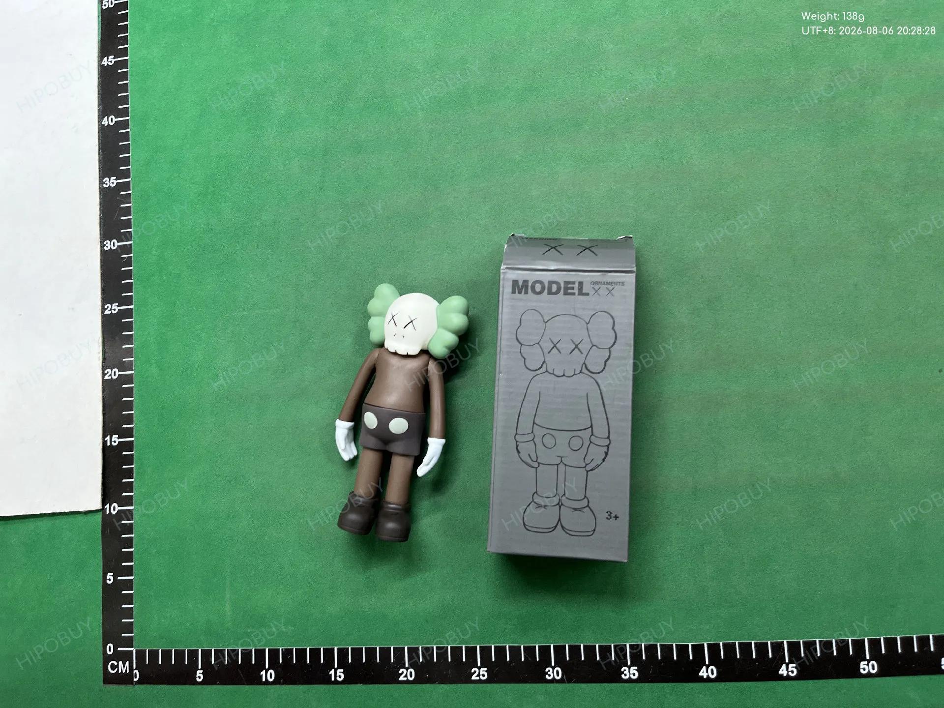 Foto QC 3 de KAWS Holiday Companion Passing Through PVC Figure