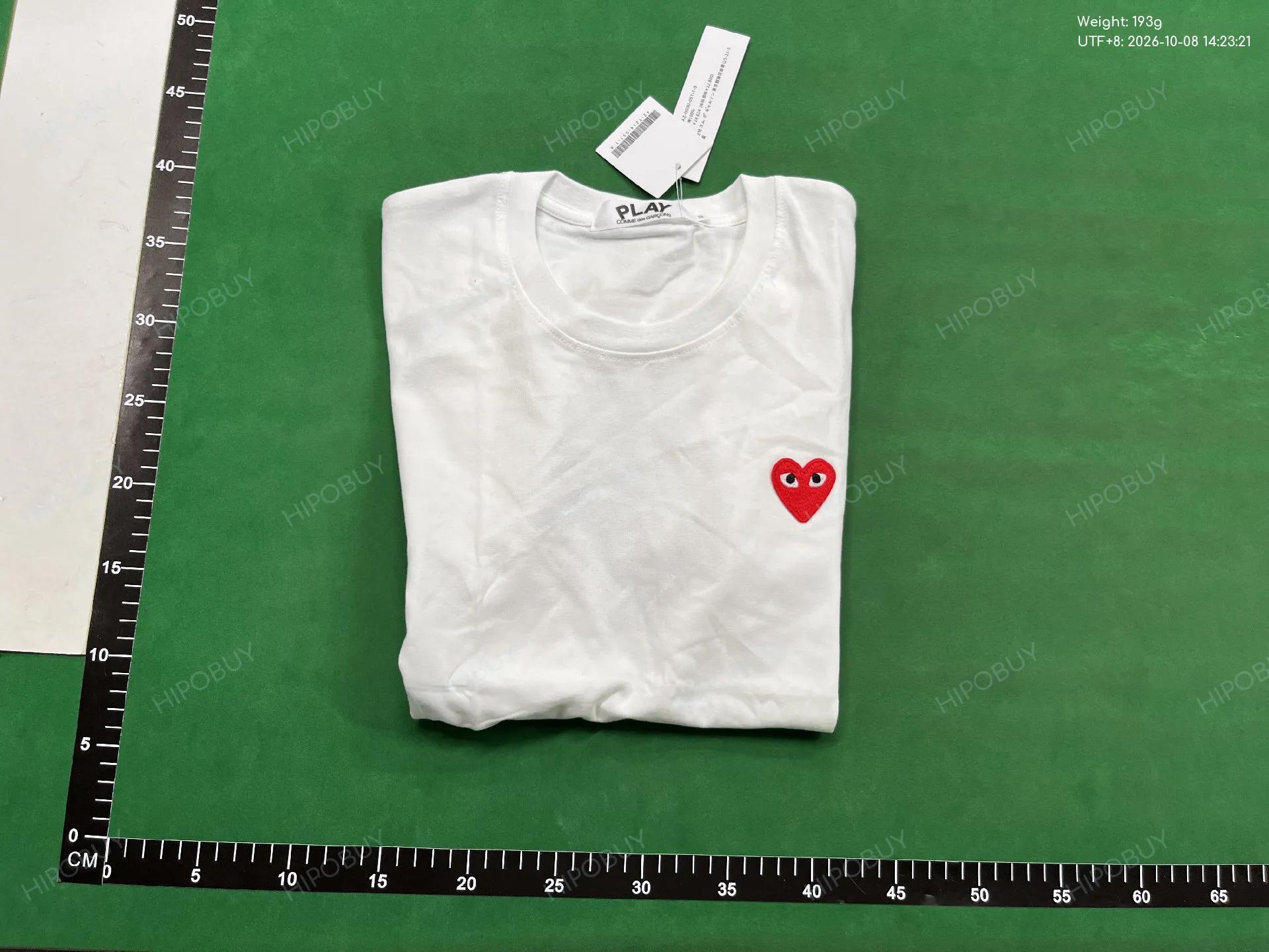 Foto QC 8 de Comme des Garçons PLAY T-shirt Small Black Heart Patch Navy