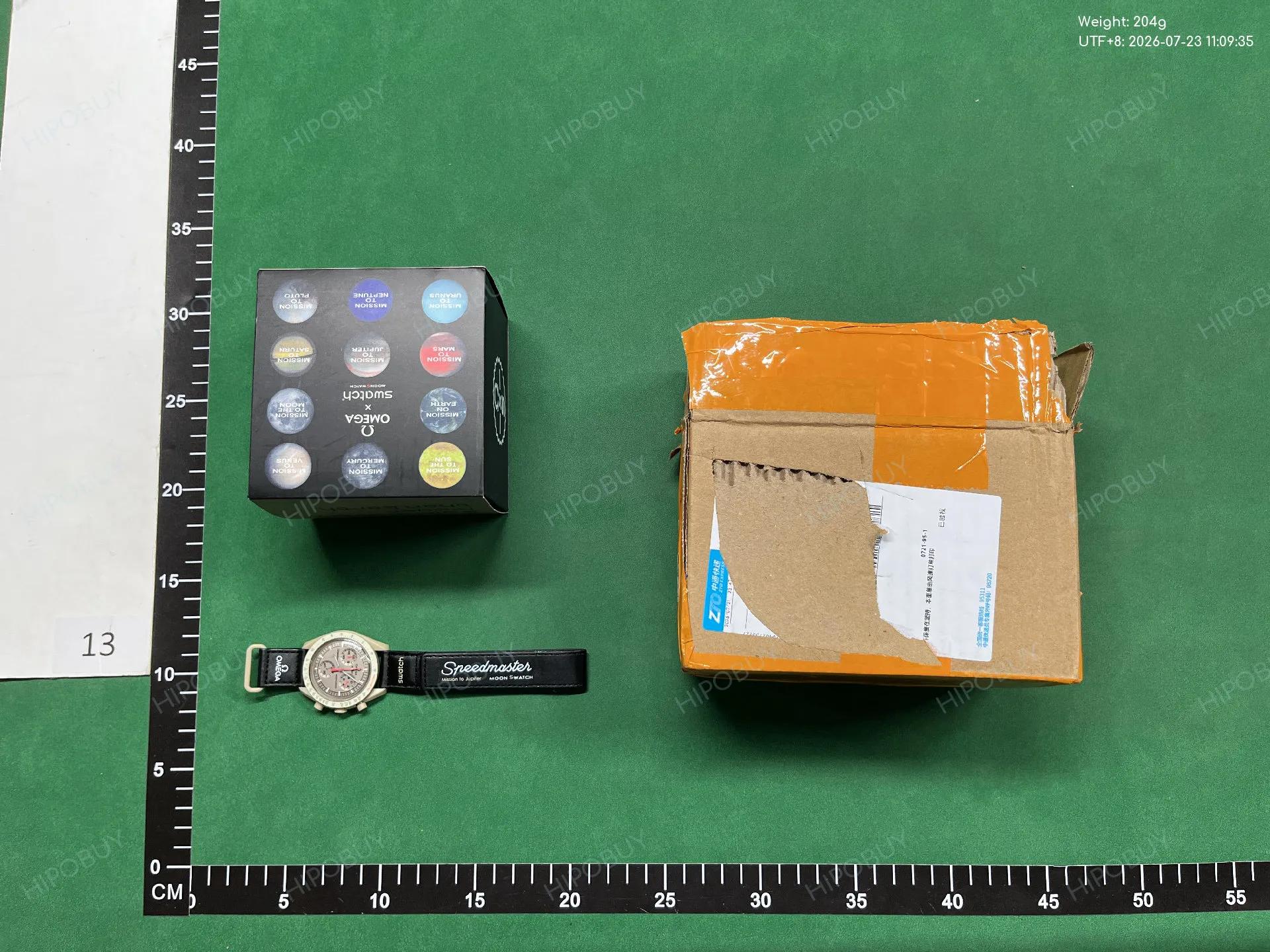 Foto QC 3 de Omega x Swatch Bioceramic Moonswatch Mission To Pluto SO33M101