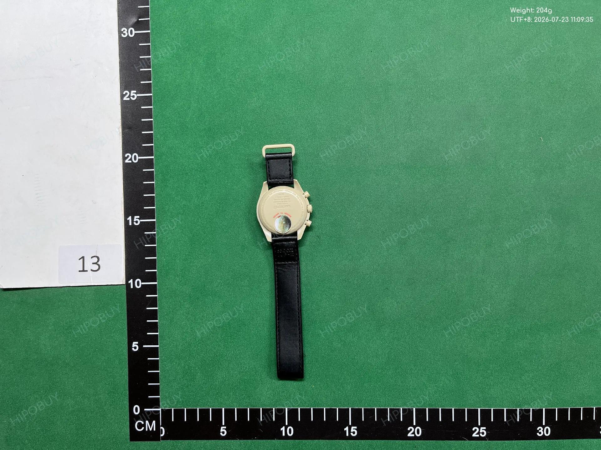 Foto QC 2 de Omega x Swatch Bioceramic Moonswatch Mission To Pluto SO33M101