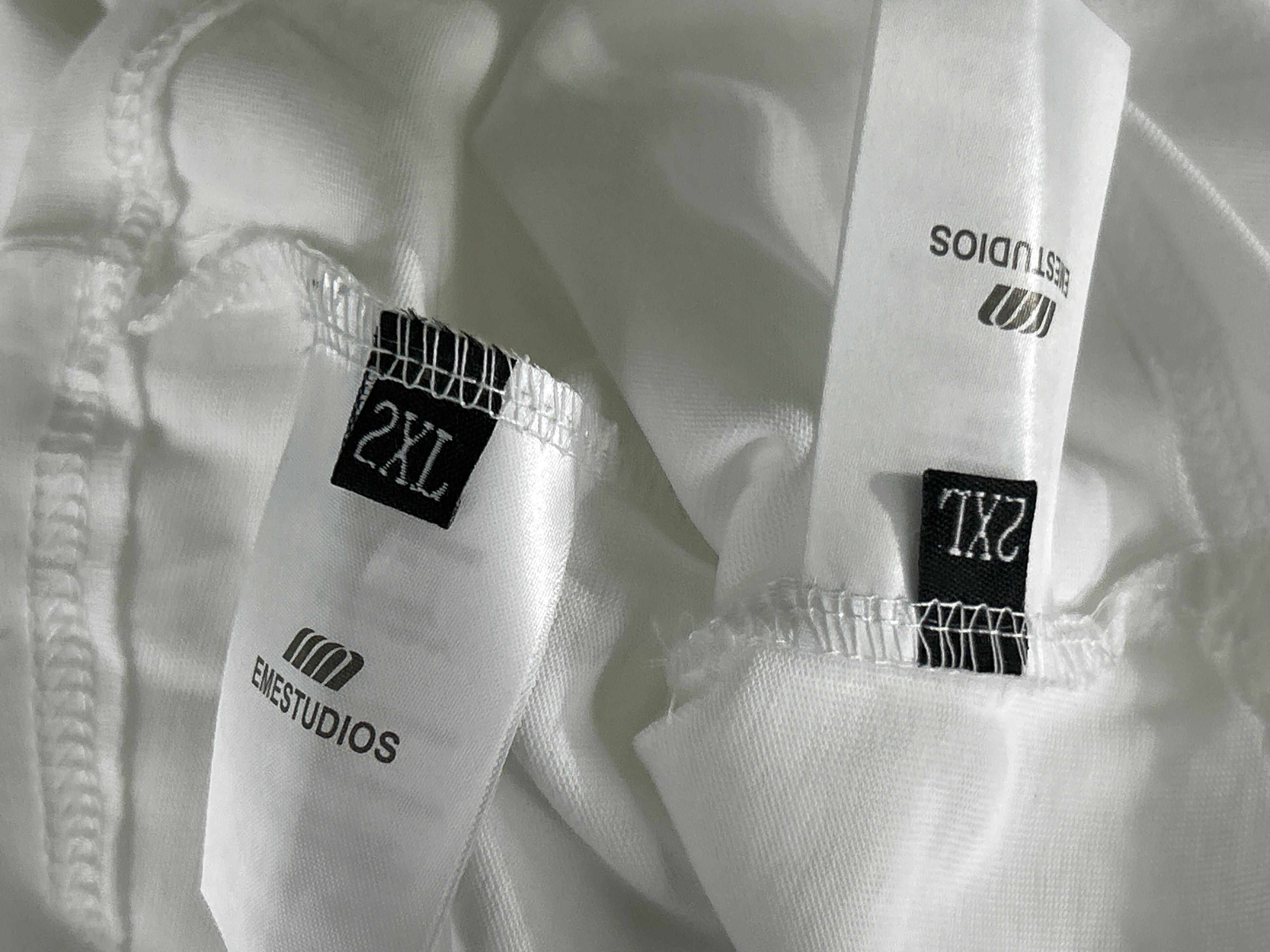 Foto QC 6 de Emestudios SS26 T-shirt Building A Community Graphic Cream
