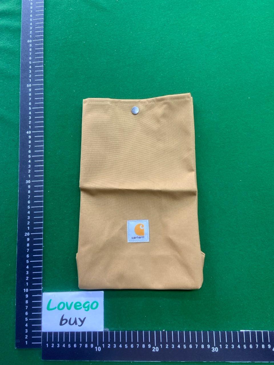 Foto QC 6 de Carhartt WIP Lunch Bag Mend Camo