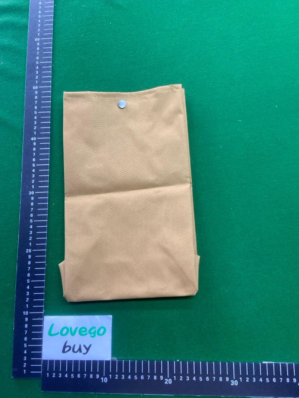 Foto QC 7 de Carhartt WIP Lunch Bag Mend Camo