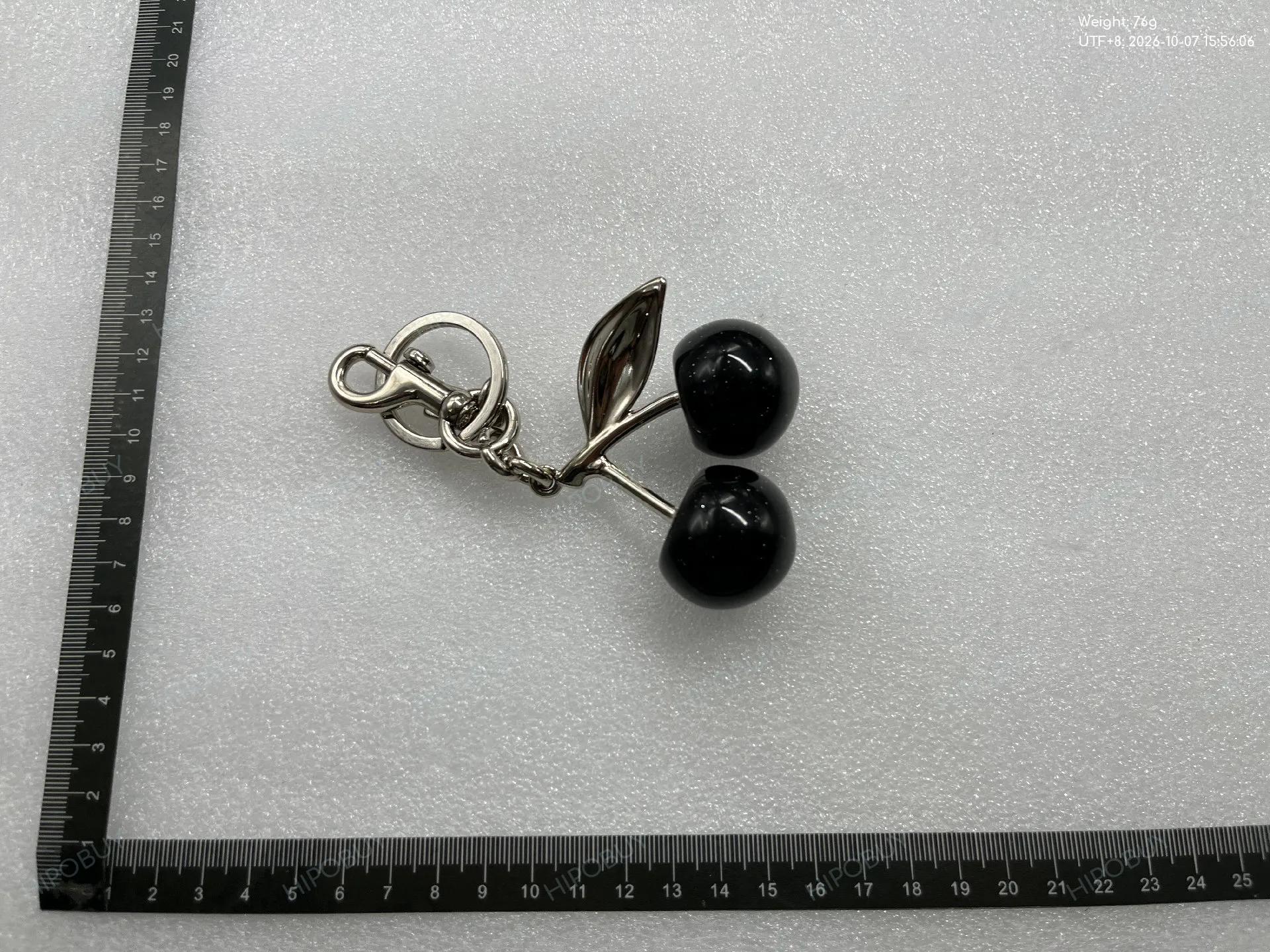 Foto QC 4 de Coach Pretzel Key Holder And Bag Charm Gold
