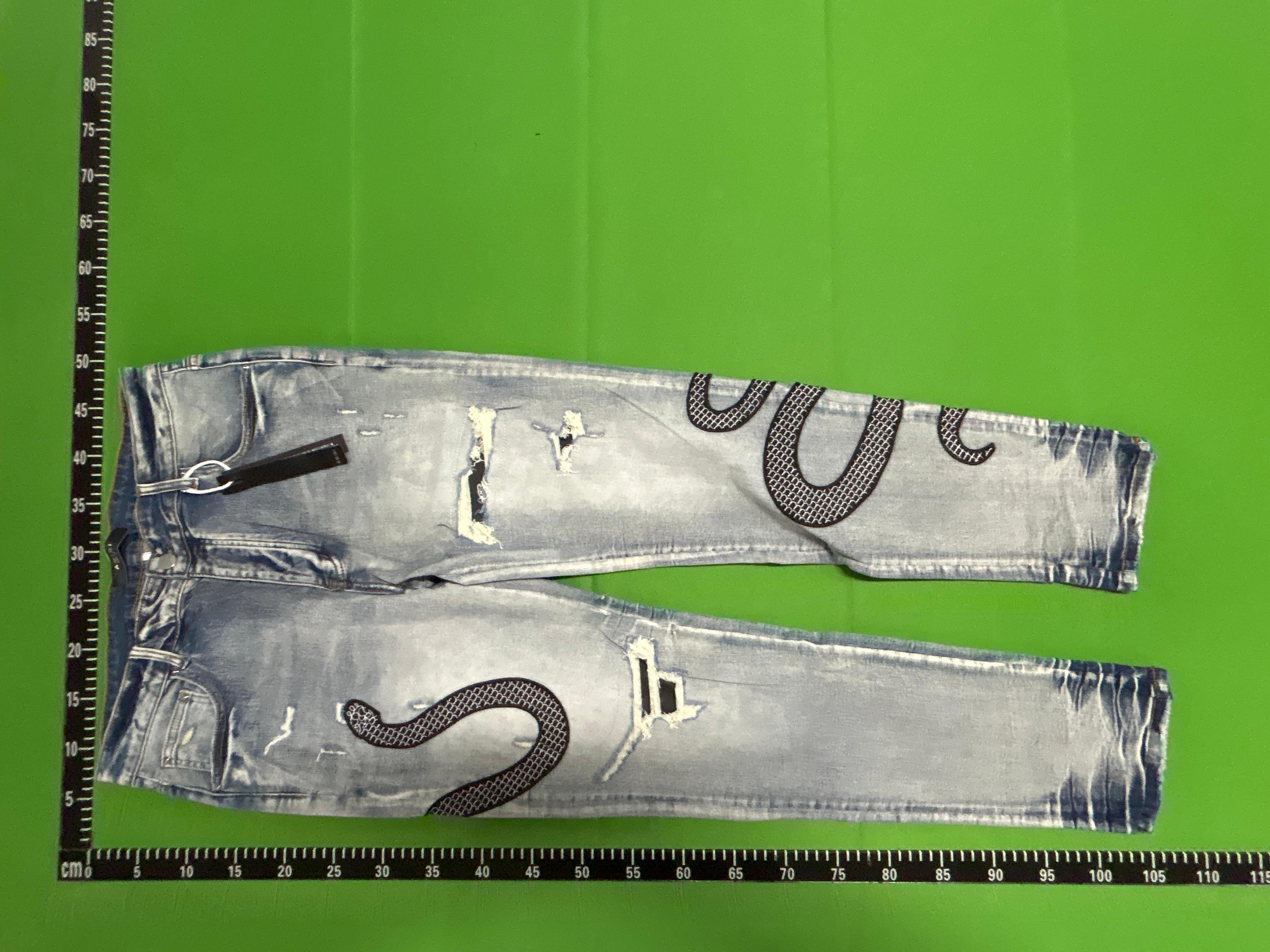 Foto QC 3 de Amiri Jeans Distressed Light Wash