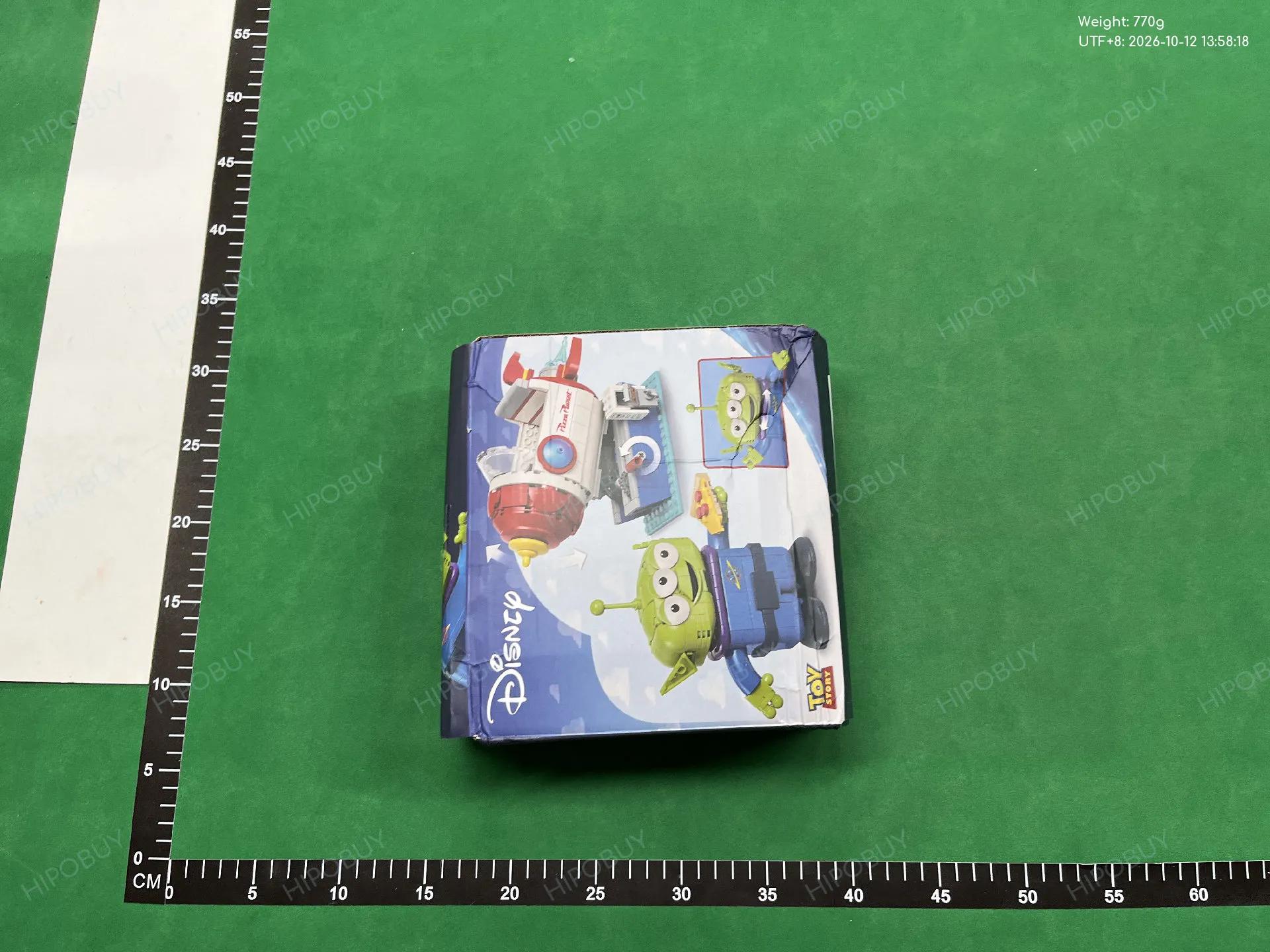 Foto QC 5 de Disney Toy Story Alien Pizza Planet Rocket Ride Building Block Set