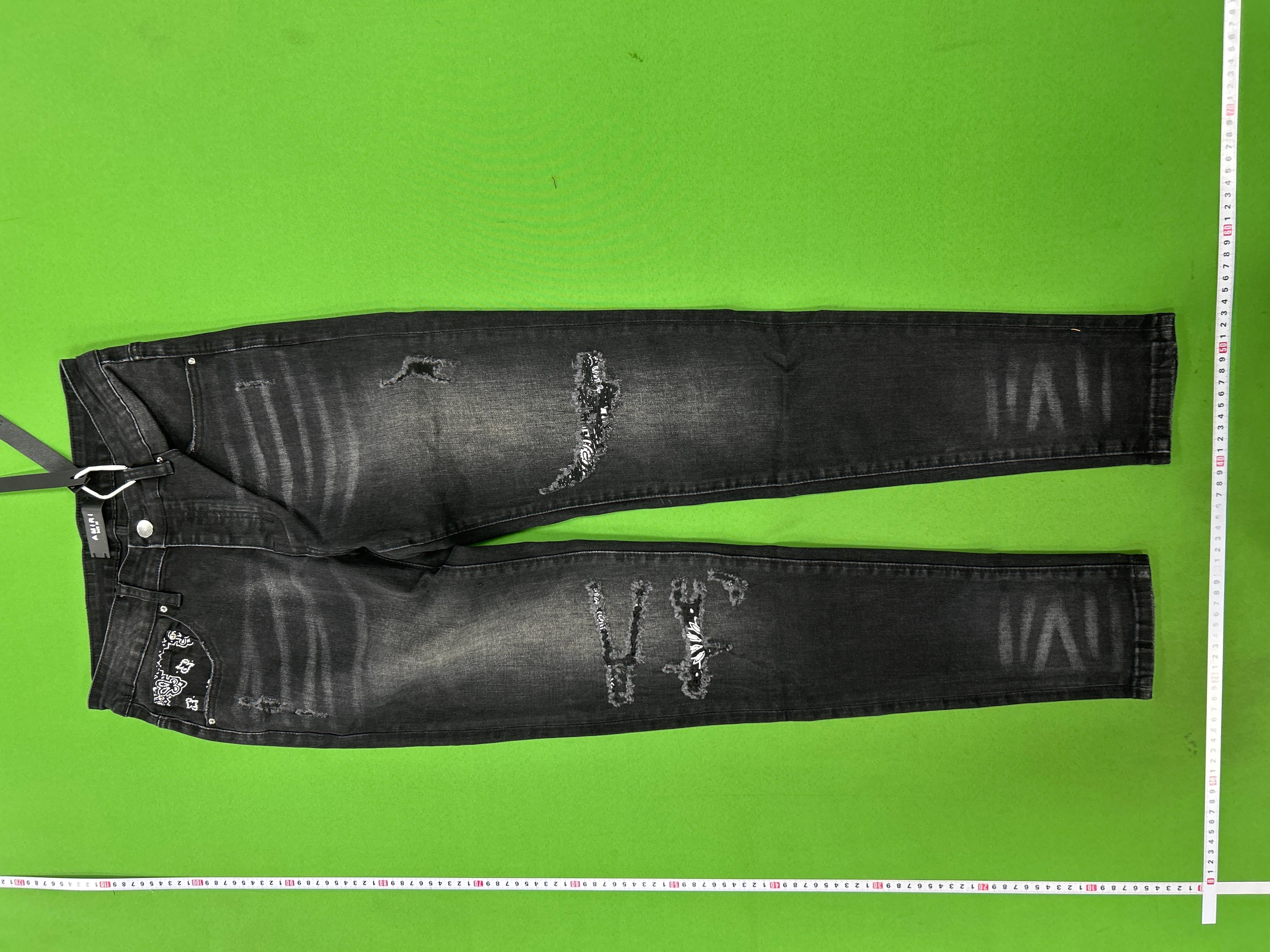 Foto QC 7 de Amiri Jeans Distressed Light Wash