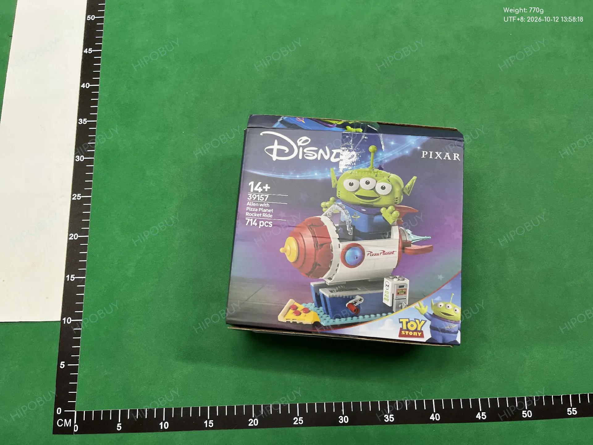 Foto QC 4 de Disney Toy Story Alien Pizza Planet Rocket Ride Building Block Set