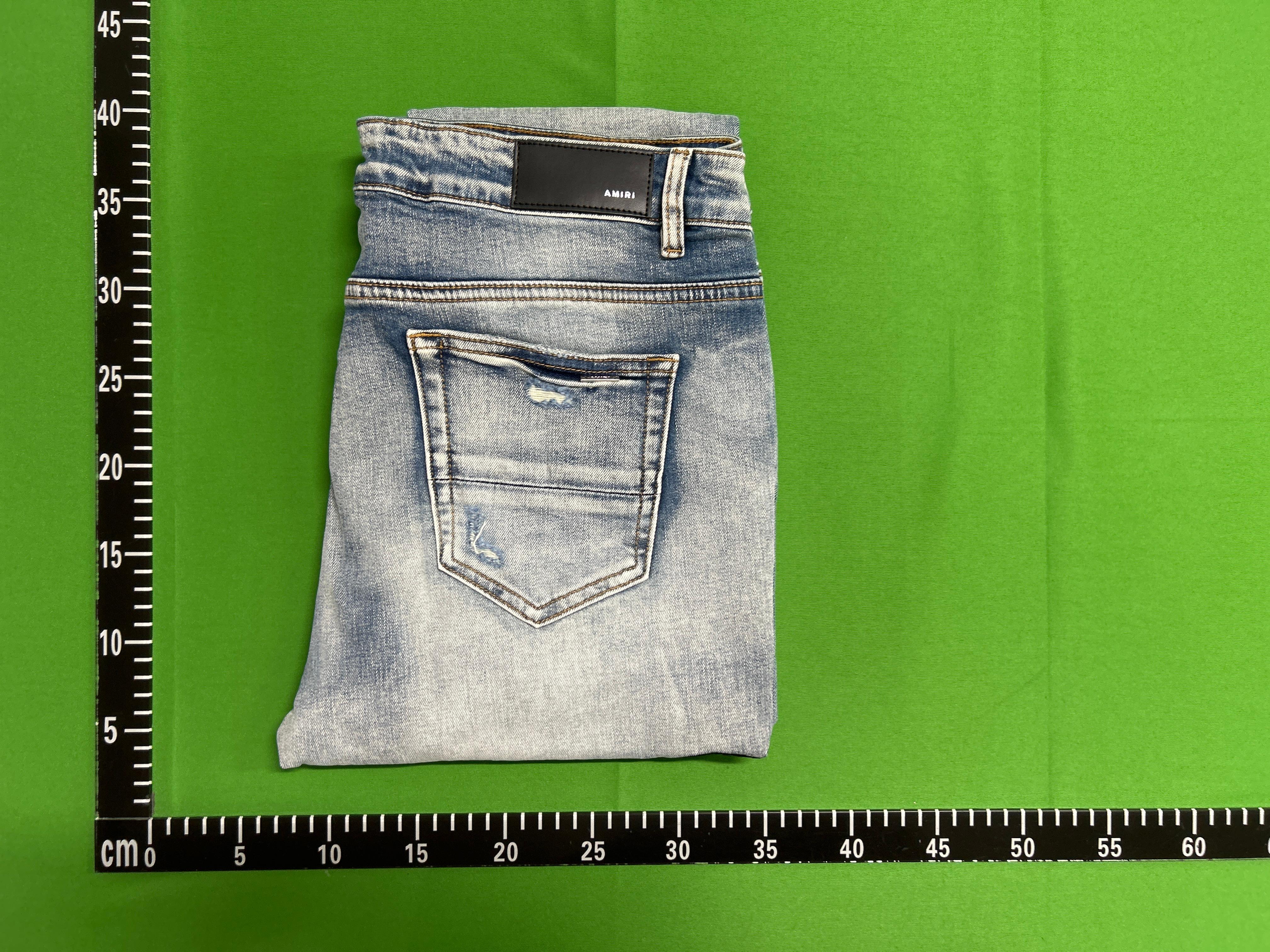 Foto QC 1 de Amiri Jeans Distressed Light Wash