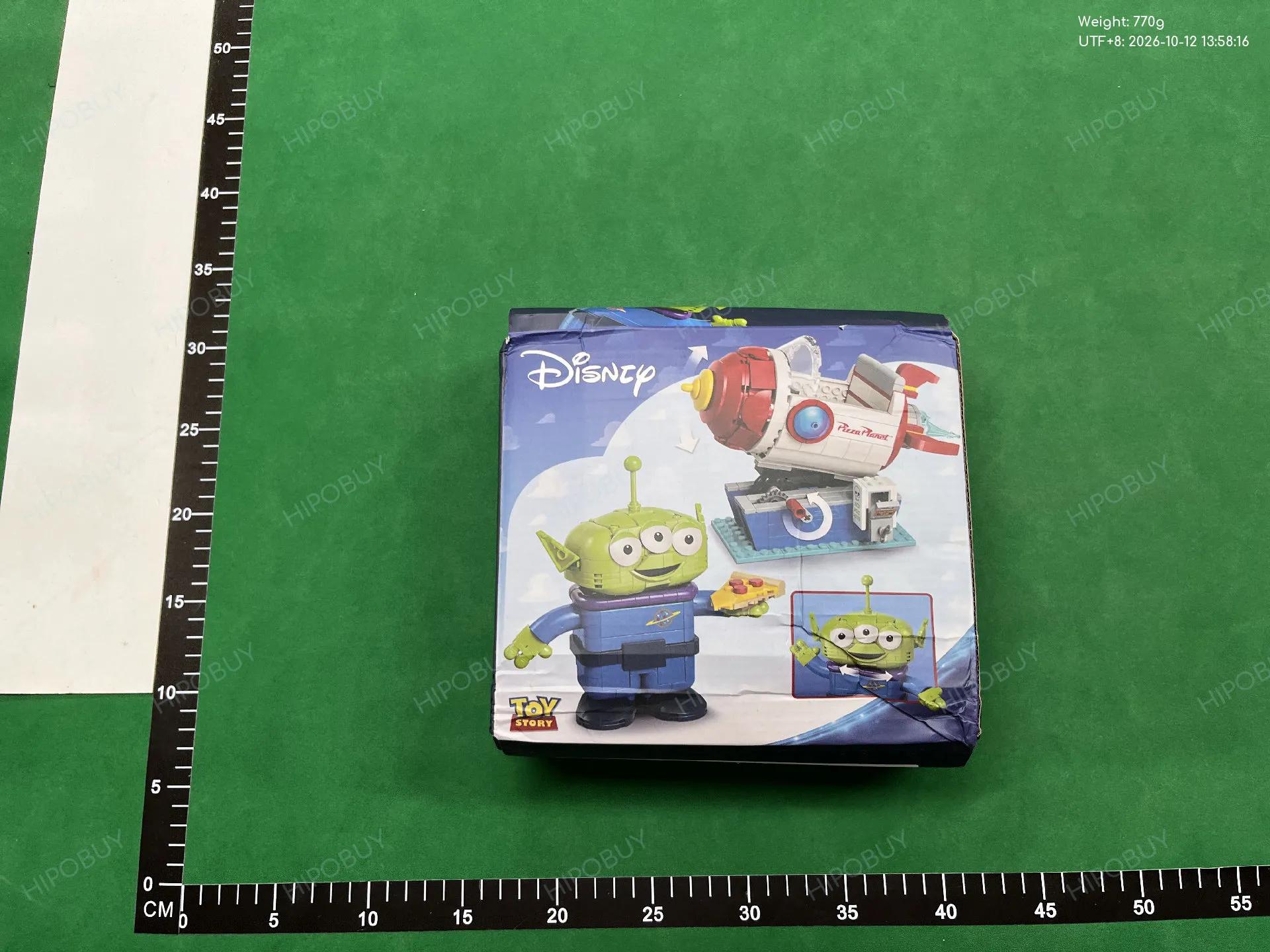 Foto QC 3 de Disney Toy Story Alien Pizza Planet Rocket Ride Building Block Set