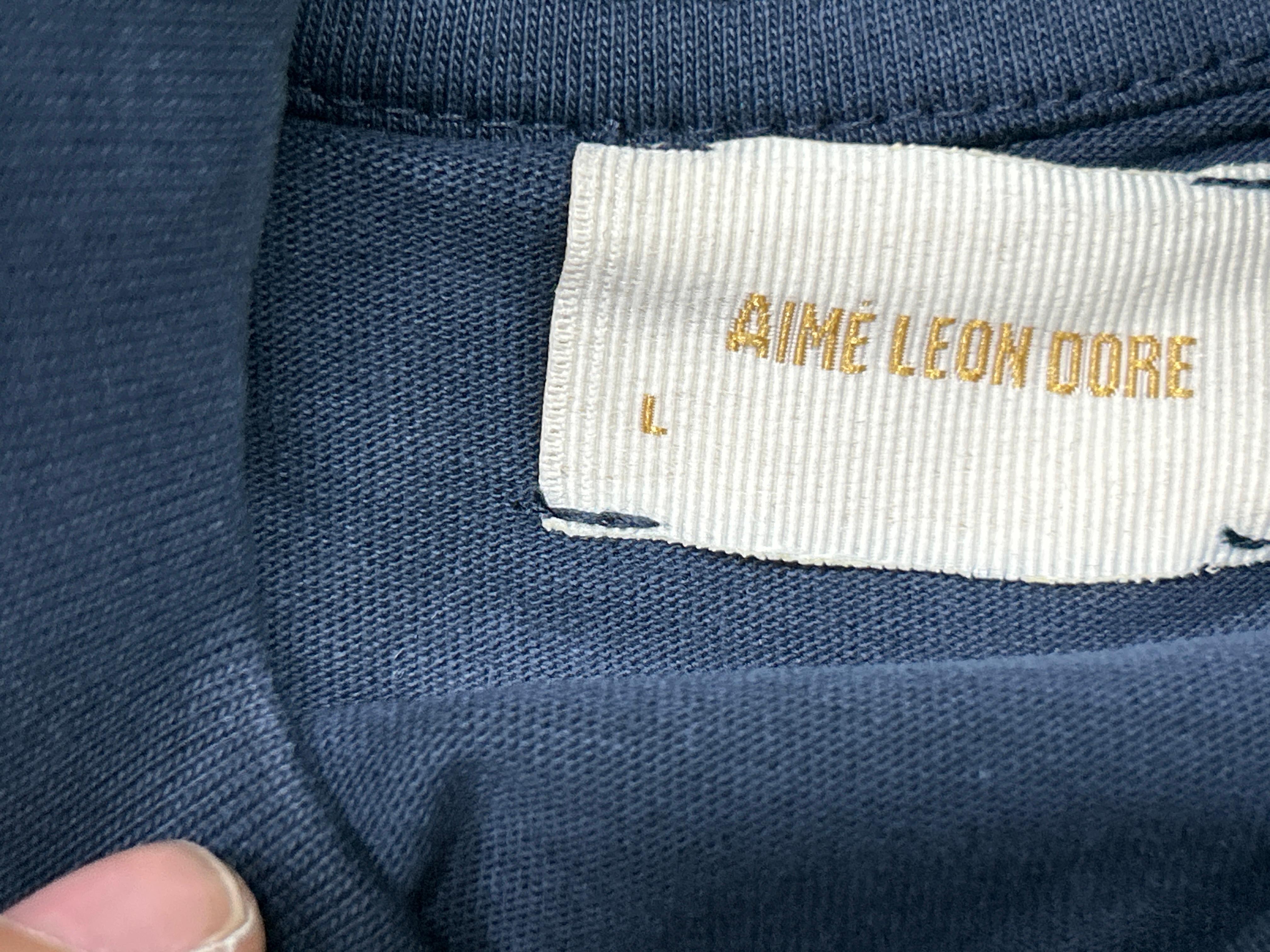 Foto QC 2 de Aimé Leon Dore Unisphere T-shirt