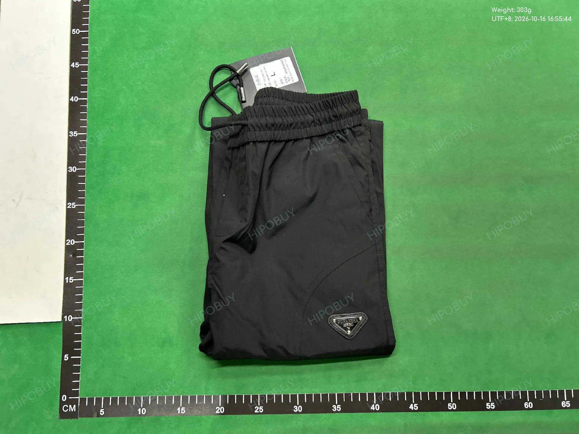 Foto QC 8 de Prada Triangle Logo Quick-Dry Flared Pants Black