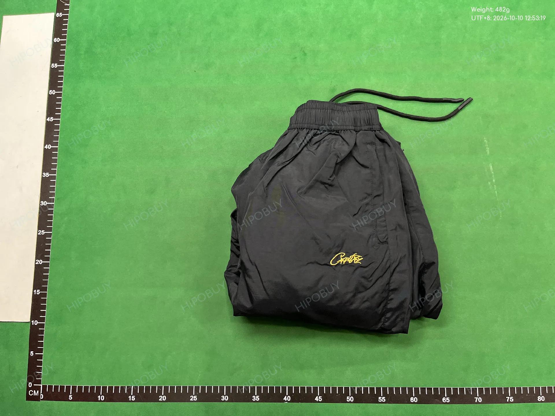 Foto QC 8 de Corteiz Brazil Pants Shell Black
