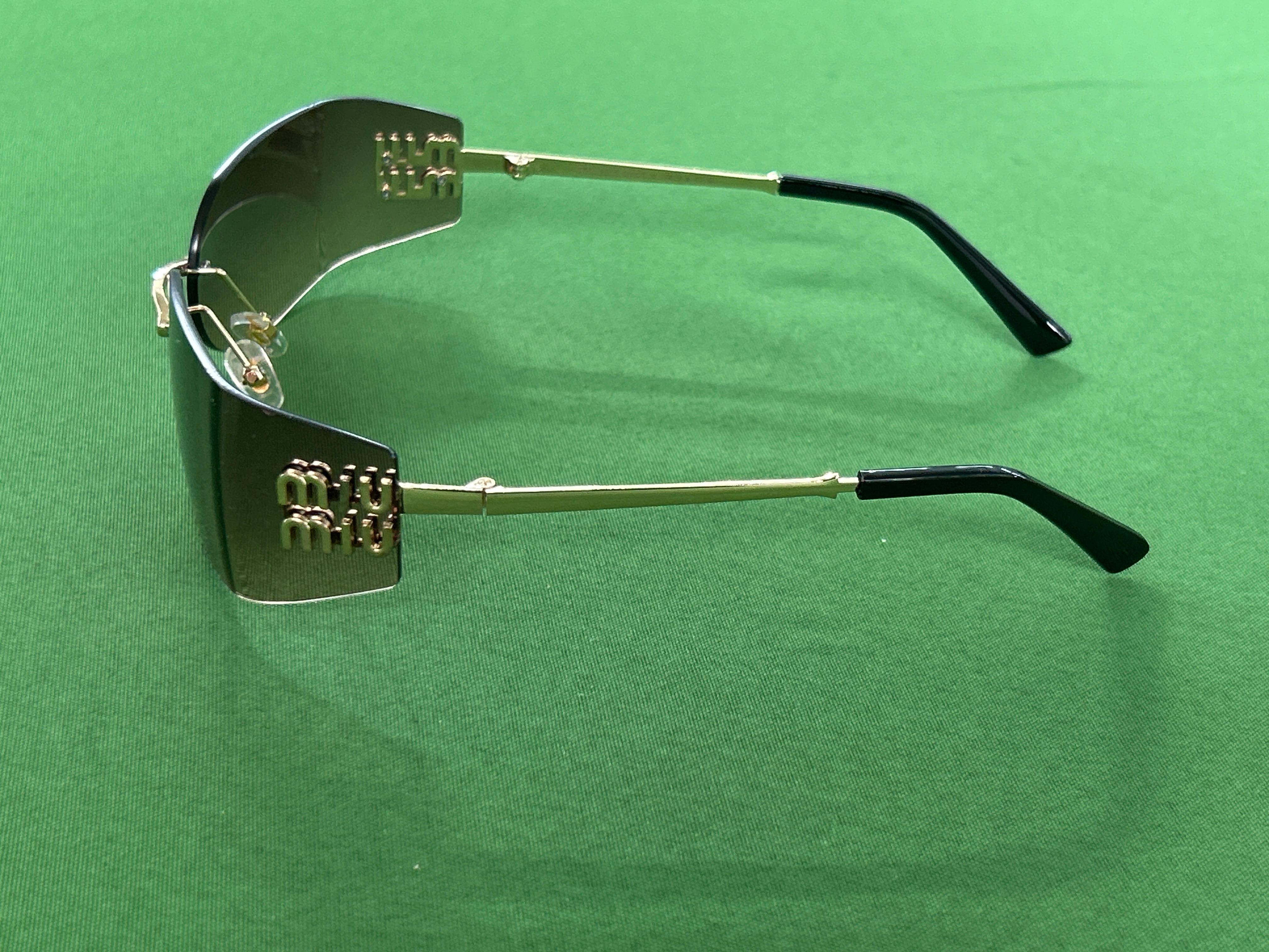 Foto QC 6 de Miu Miu Rimless Shield Metal Sunglasses Gold Gradient Brown (A51s)