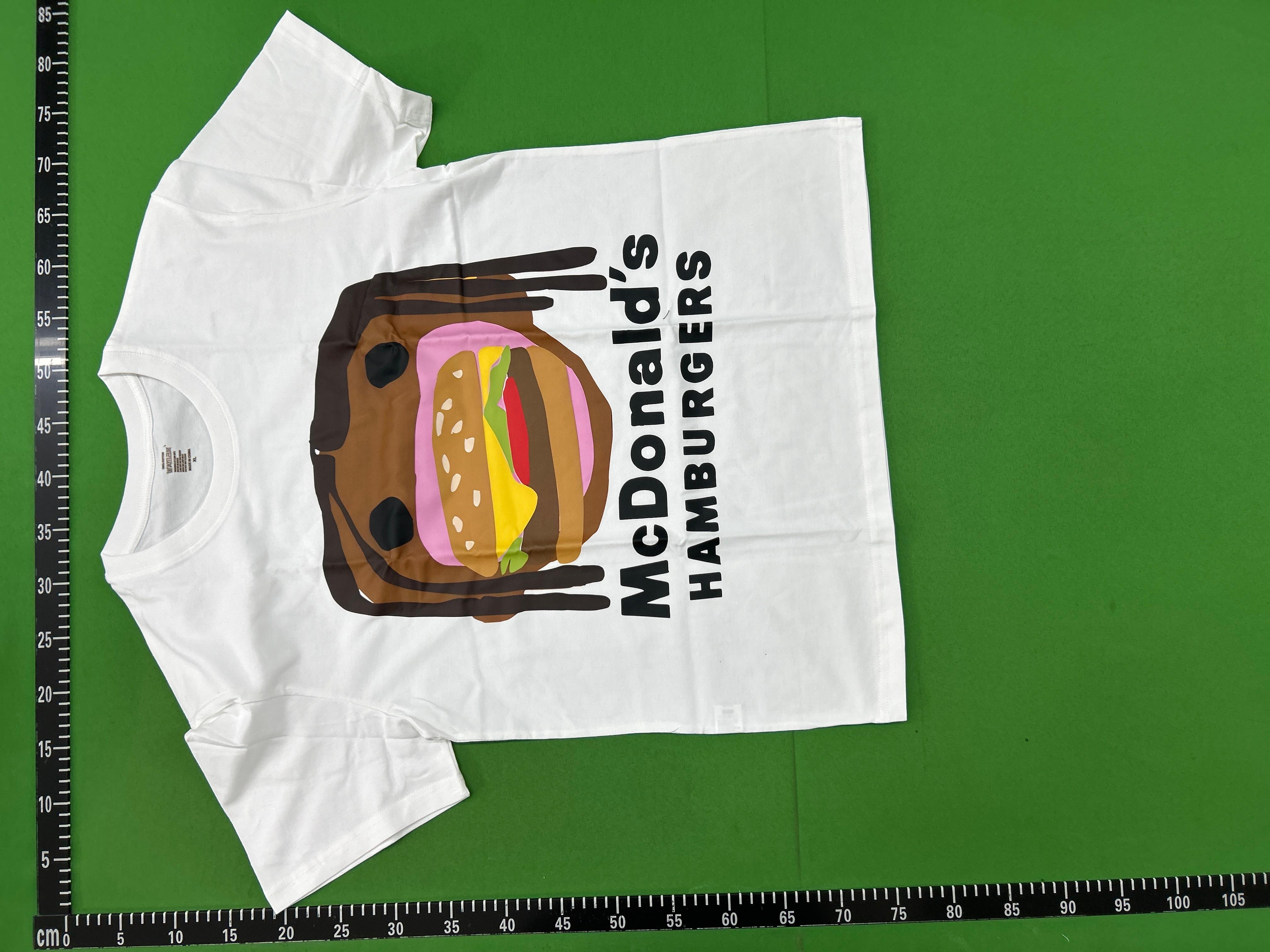 Foto QC 7 de Travis Scott x McDonald's Cactus Jack T-shirt Action Figure White