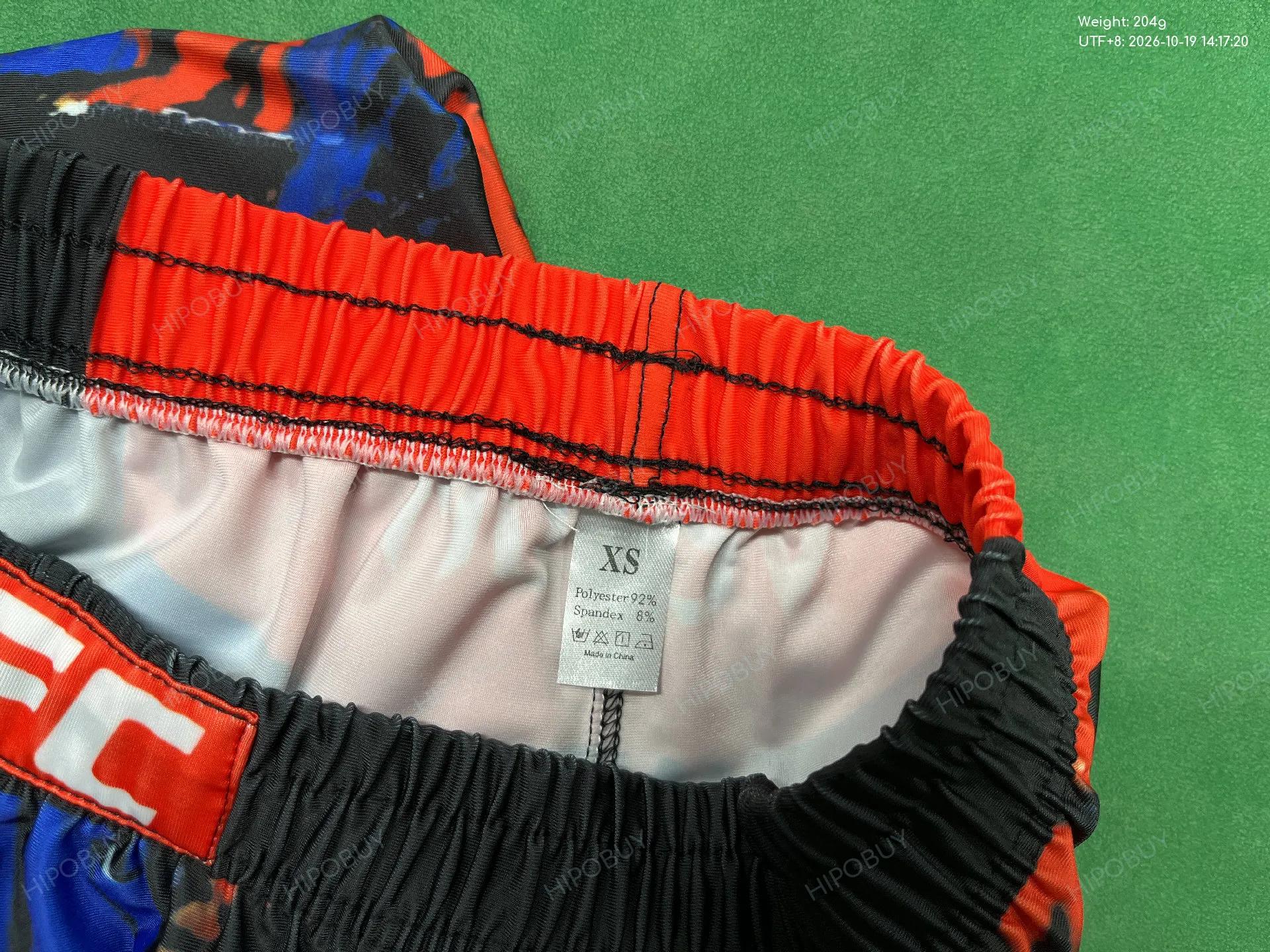 Foto QC 1 de UFC Charles Oliveira Do Bronx Shorts Venum Training Multicolor