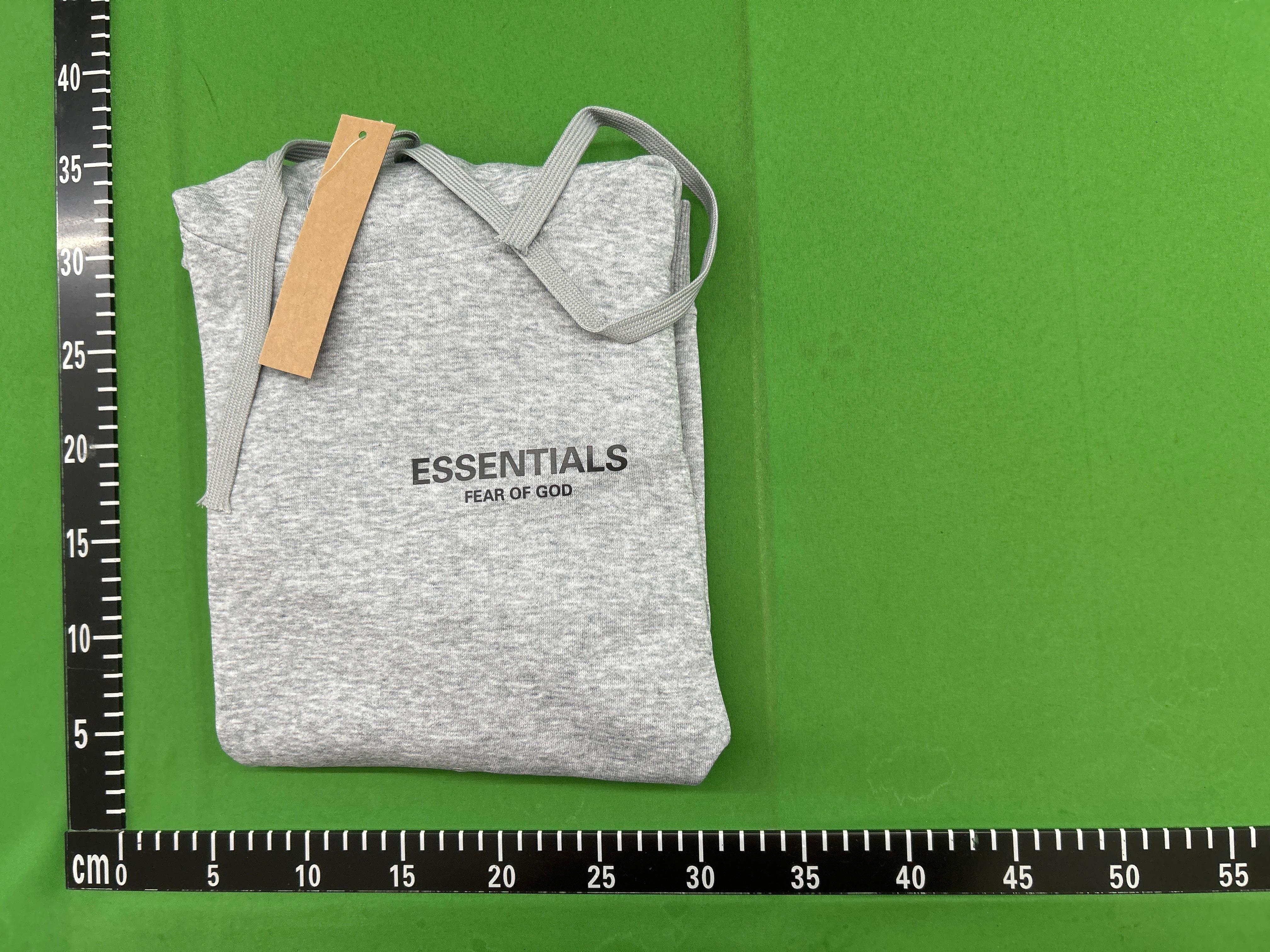 Foto QC 1 de Fear of God Essentials Flocked Logo Hoodie Jacket Black