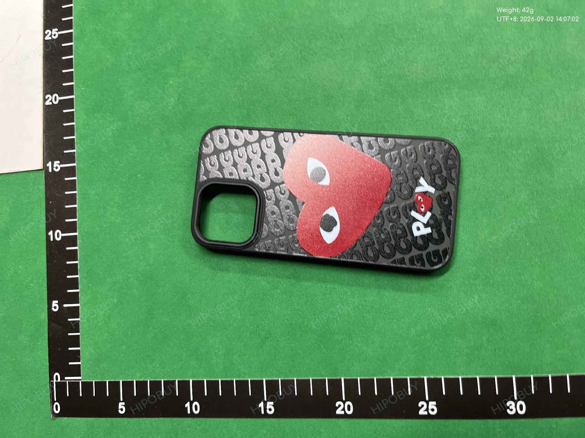 Foto QC 4 de Comme des Garcons PLAY Silicone Case for iPhone 14 Black
