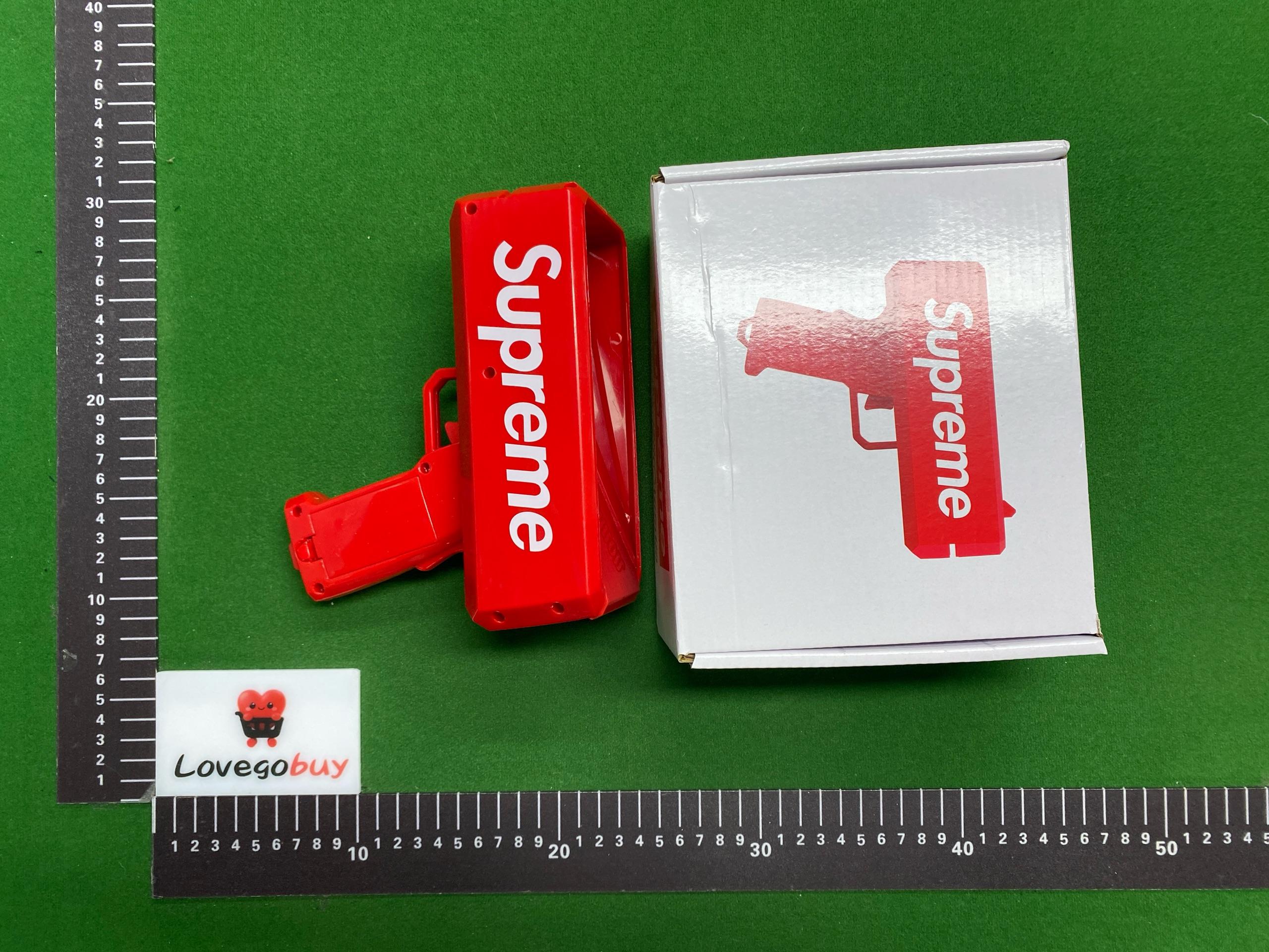 Foto QC 2 de Supreme Cash Cannon Red Plastic Money Gun